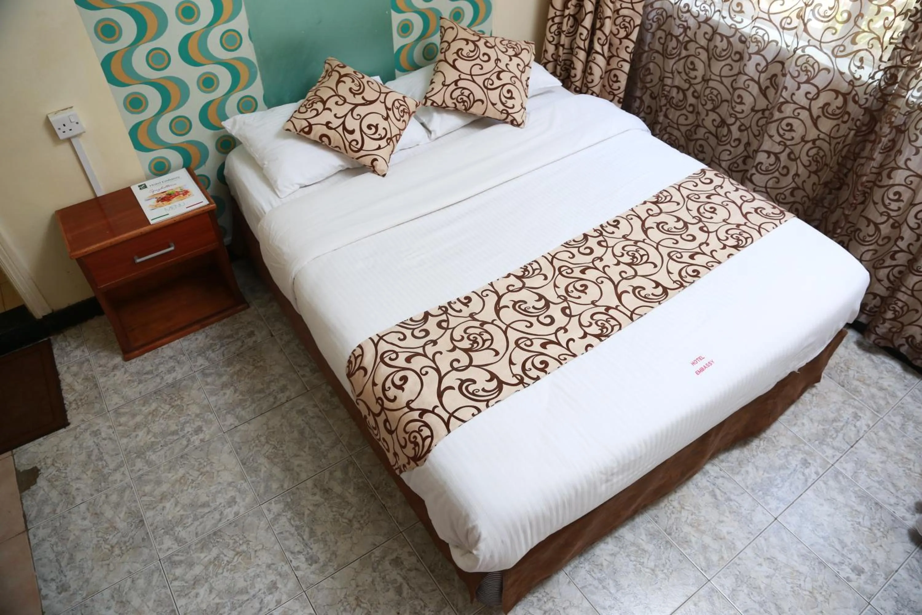 Bed in Hotel Embassy