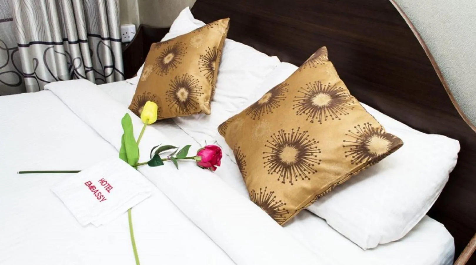 Bed in Hotel Embassy