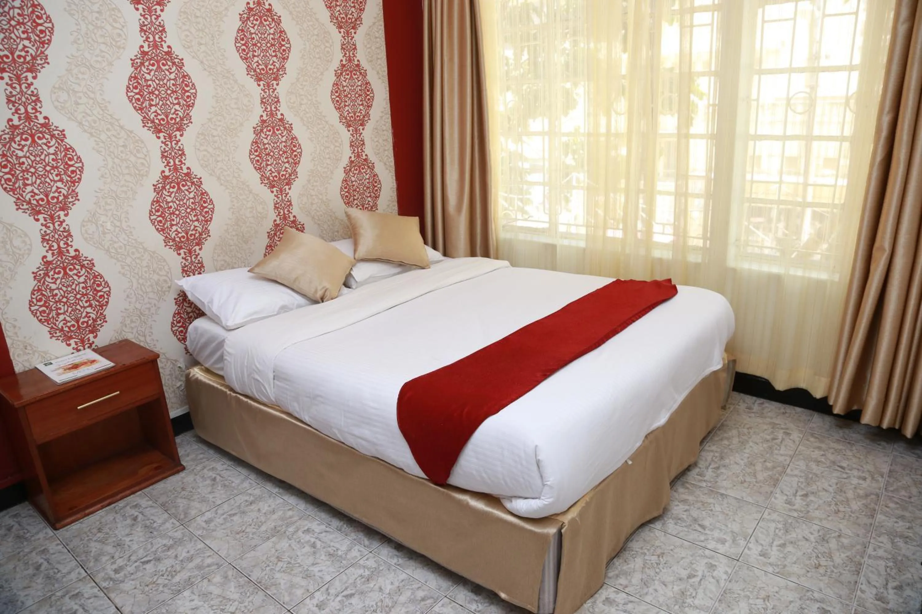 Bed in Hotel Embassy