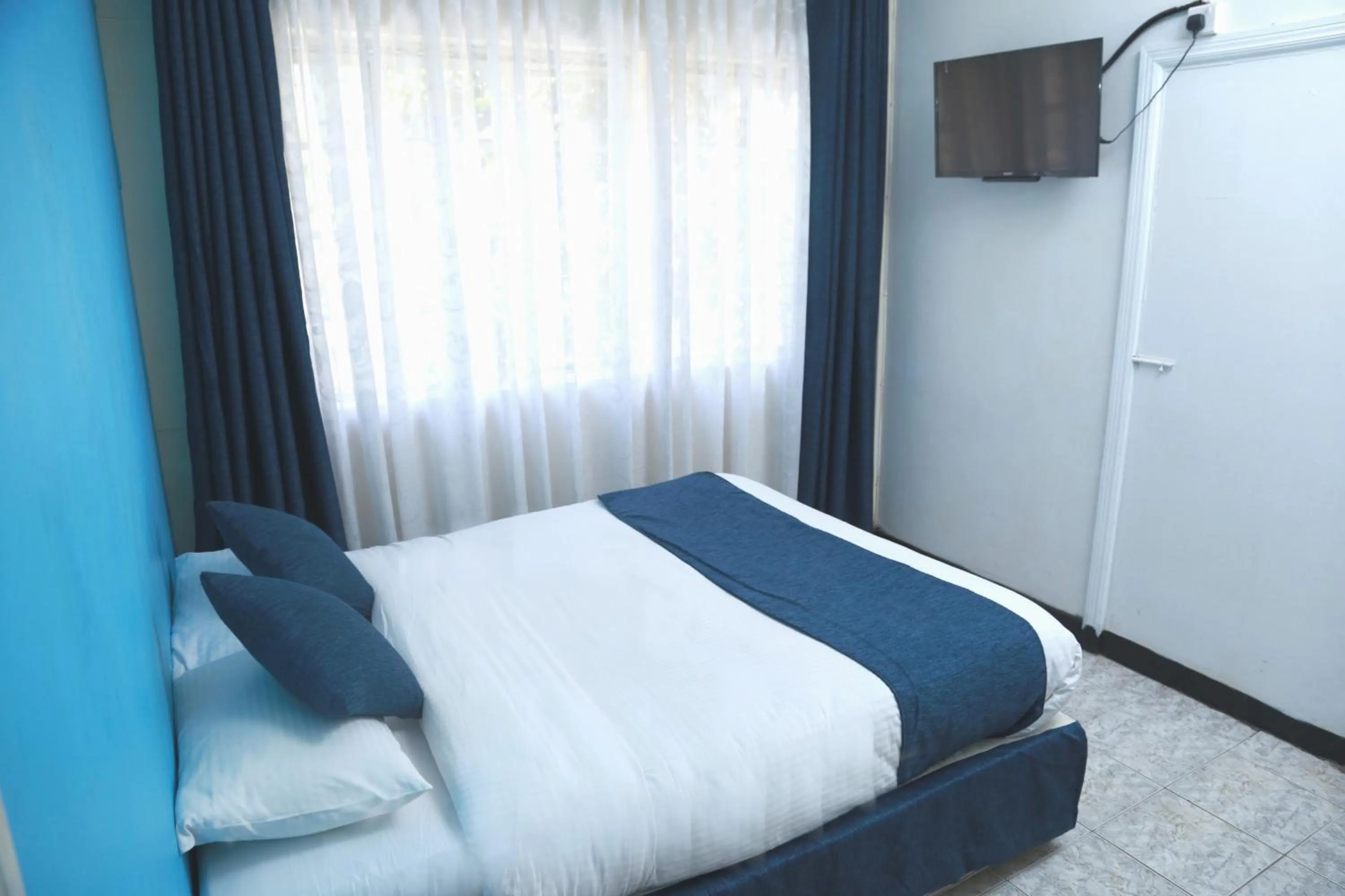 Bed in Hotel Embassy