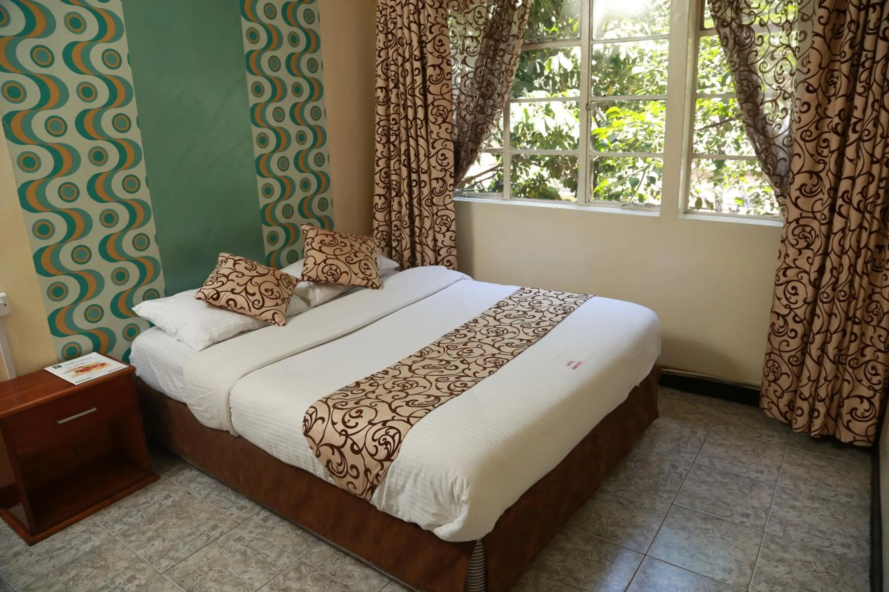 Bed in Hotel Embassy