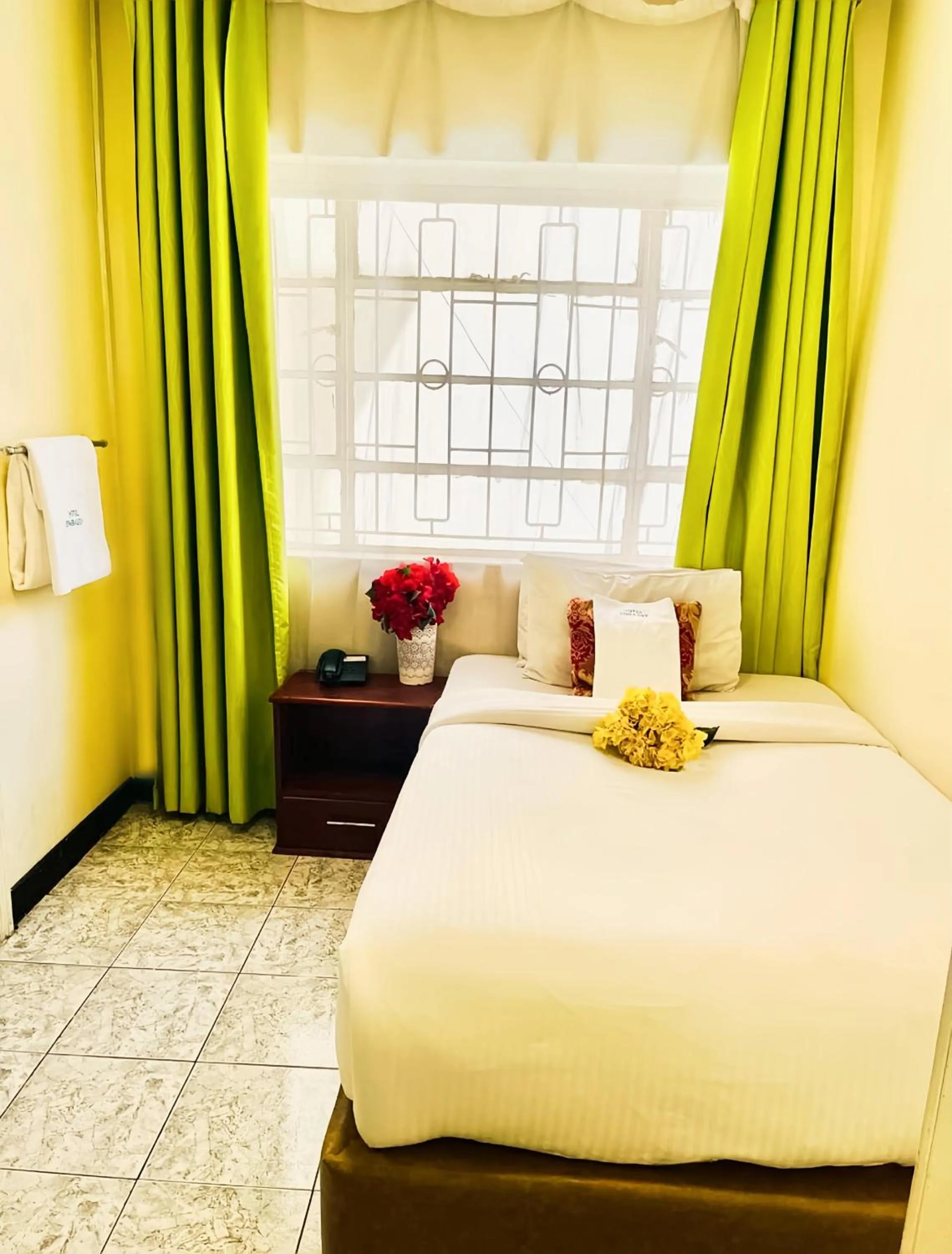 Bed in Hotel Embassy