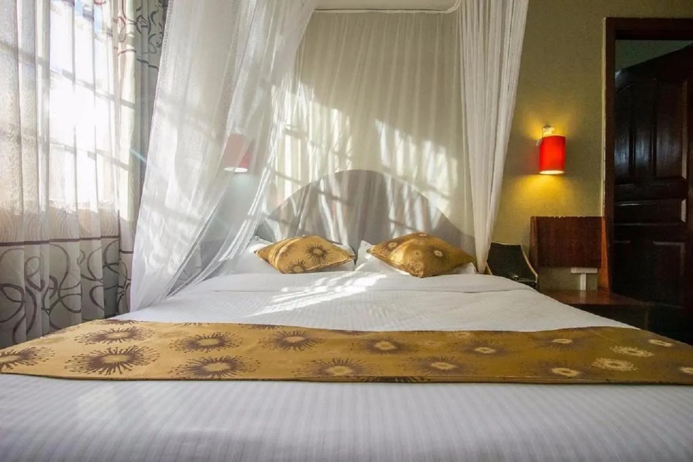 Bed in Hotel Embassy