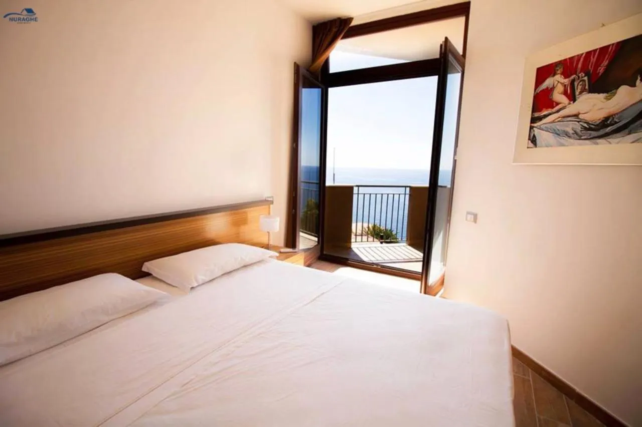 Bedroom, Bed in Nuraghe Apartments