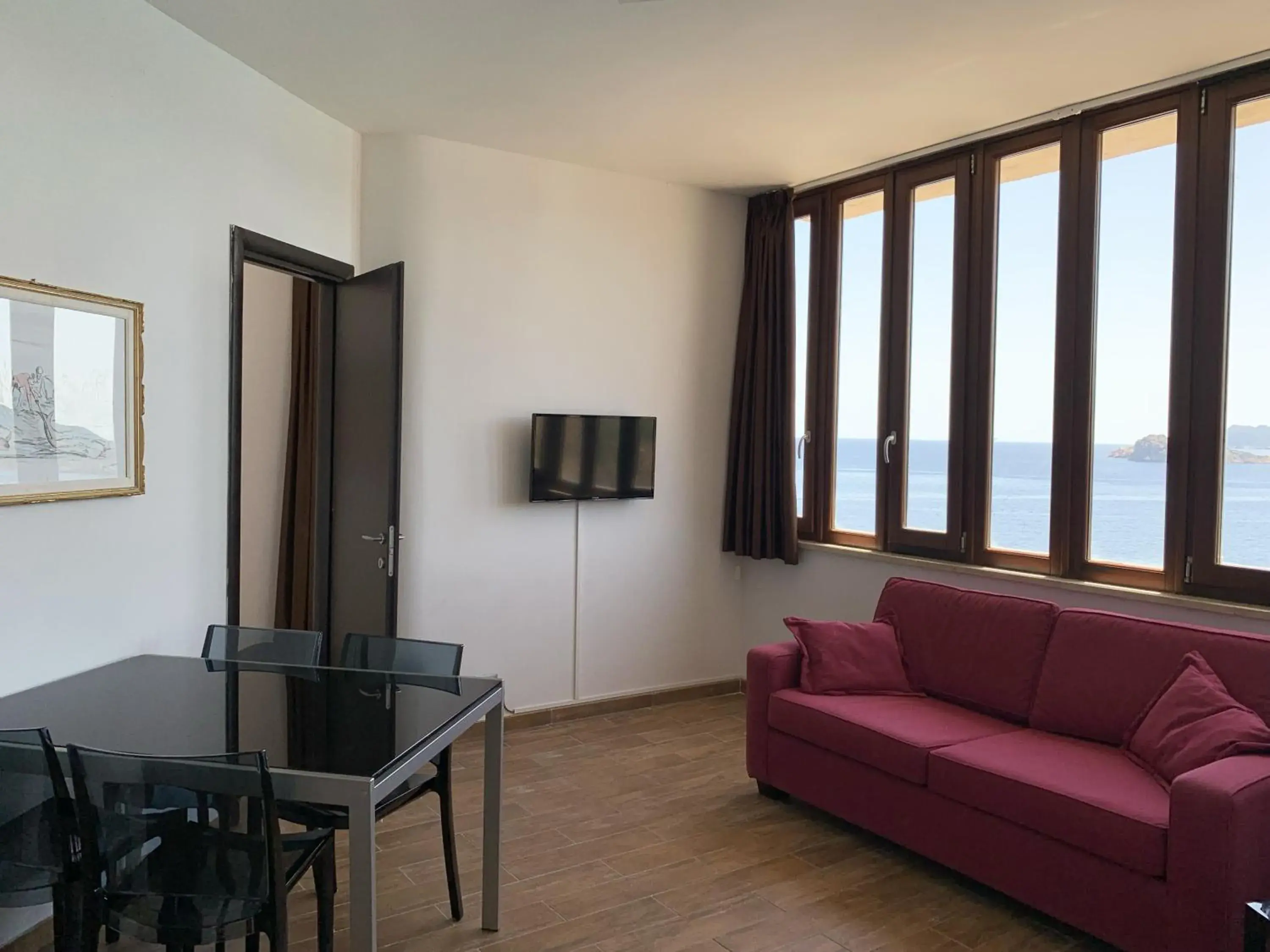 Family Room with Sea View in Nuraghe Apartments Family Room with Sea View in Nuraghe Apartments