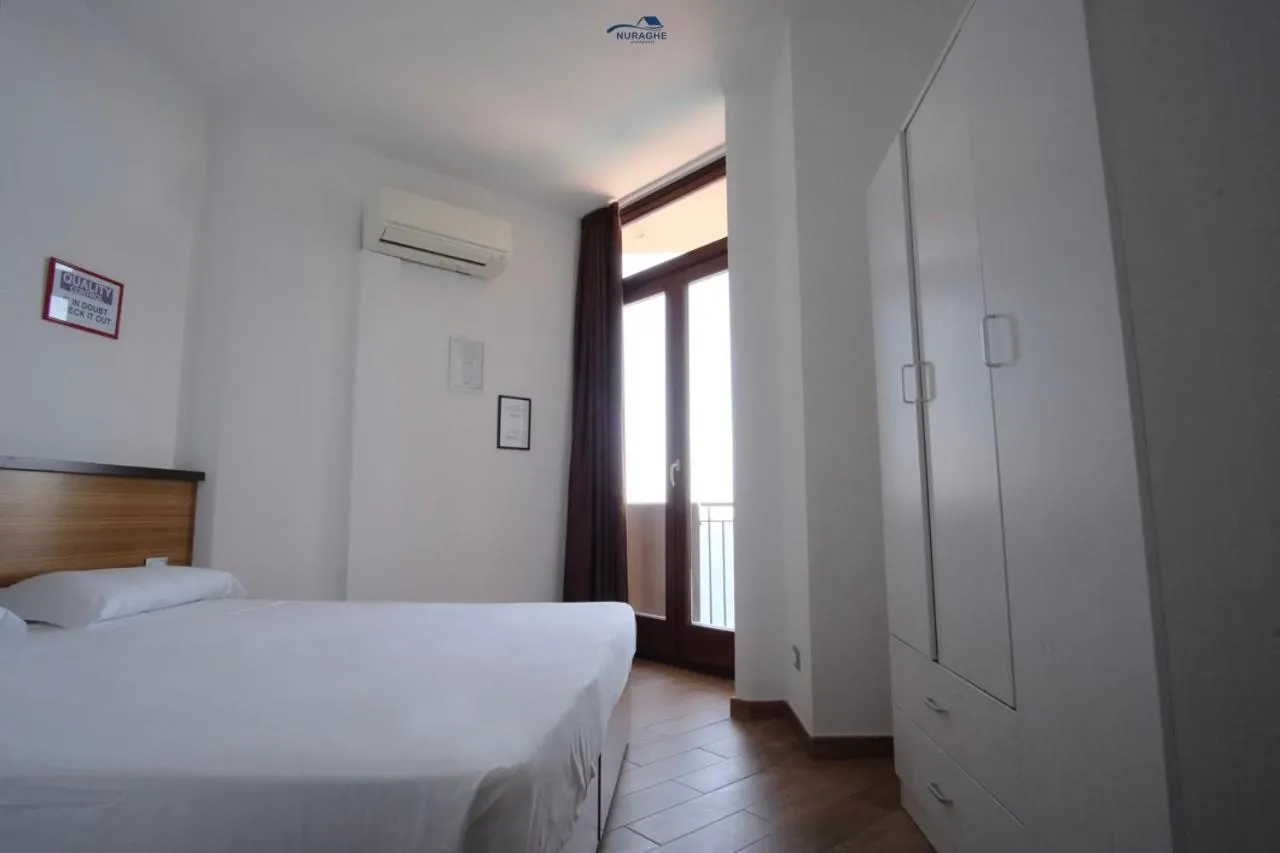 Bedroom, Bed in Nuraghe Apartments