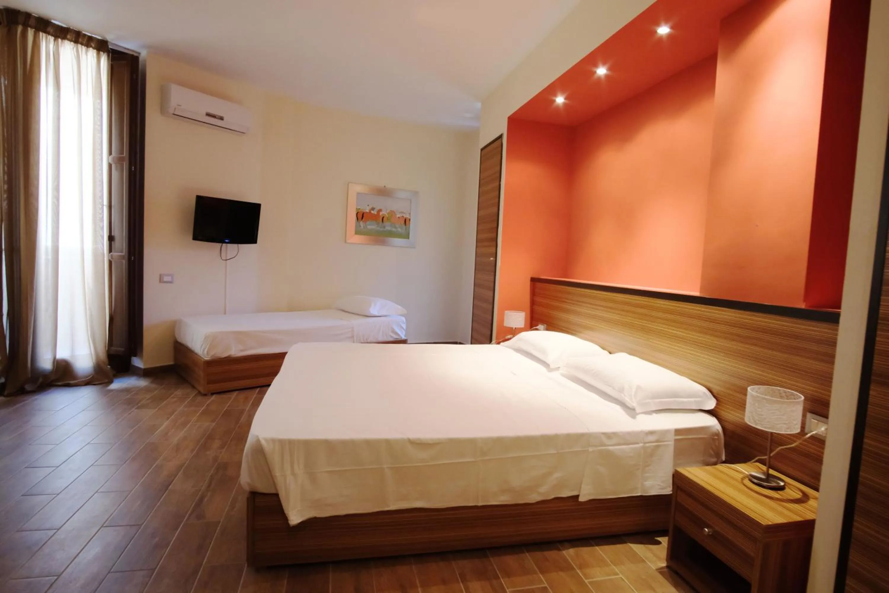 Bed in Nuraghe Apartments