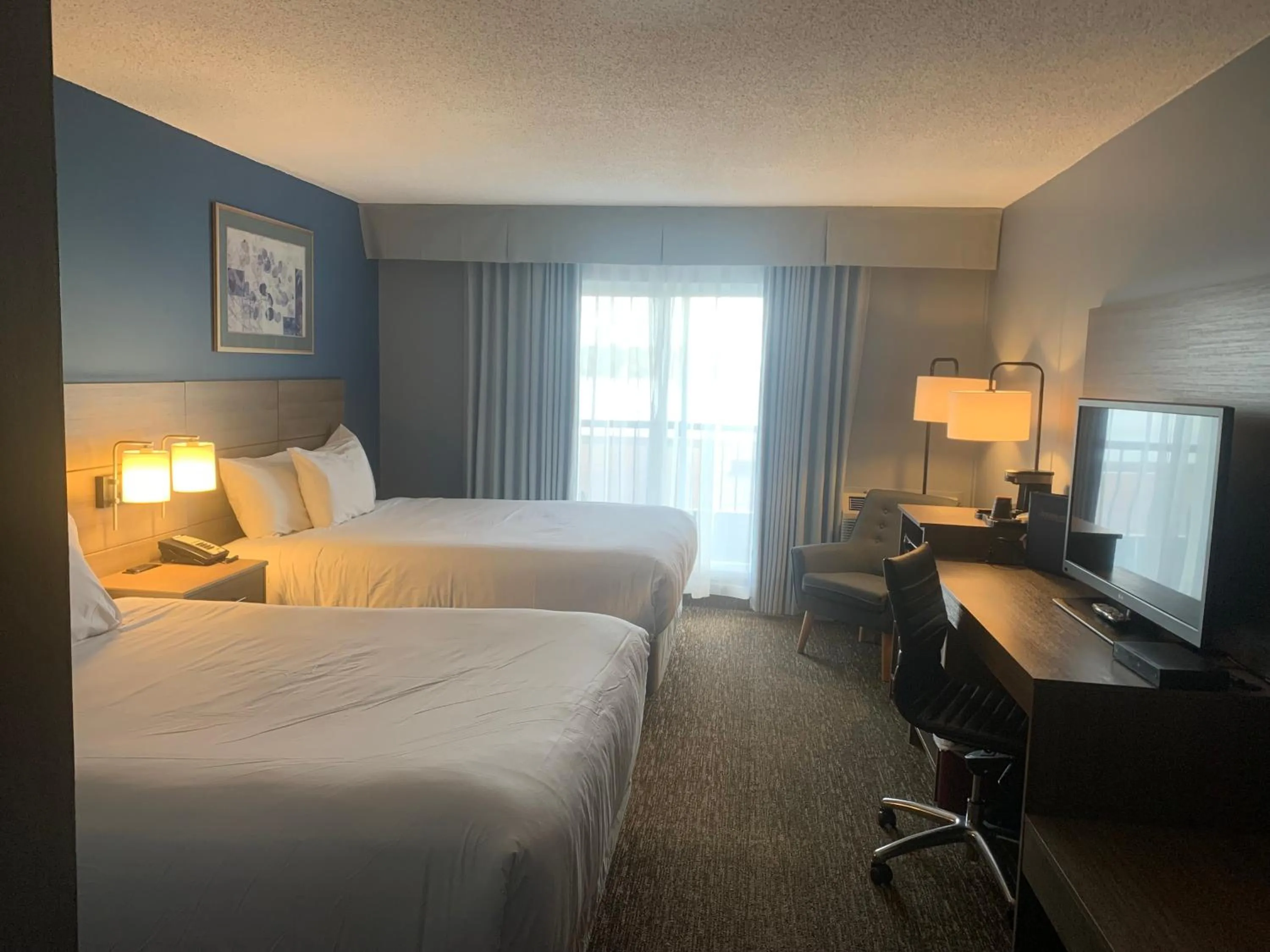 Bed in Anchor Inn and Suites