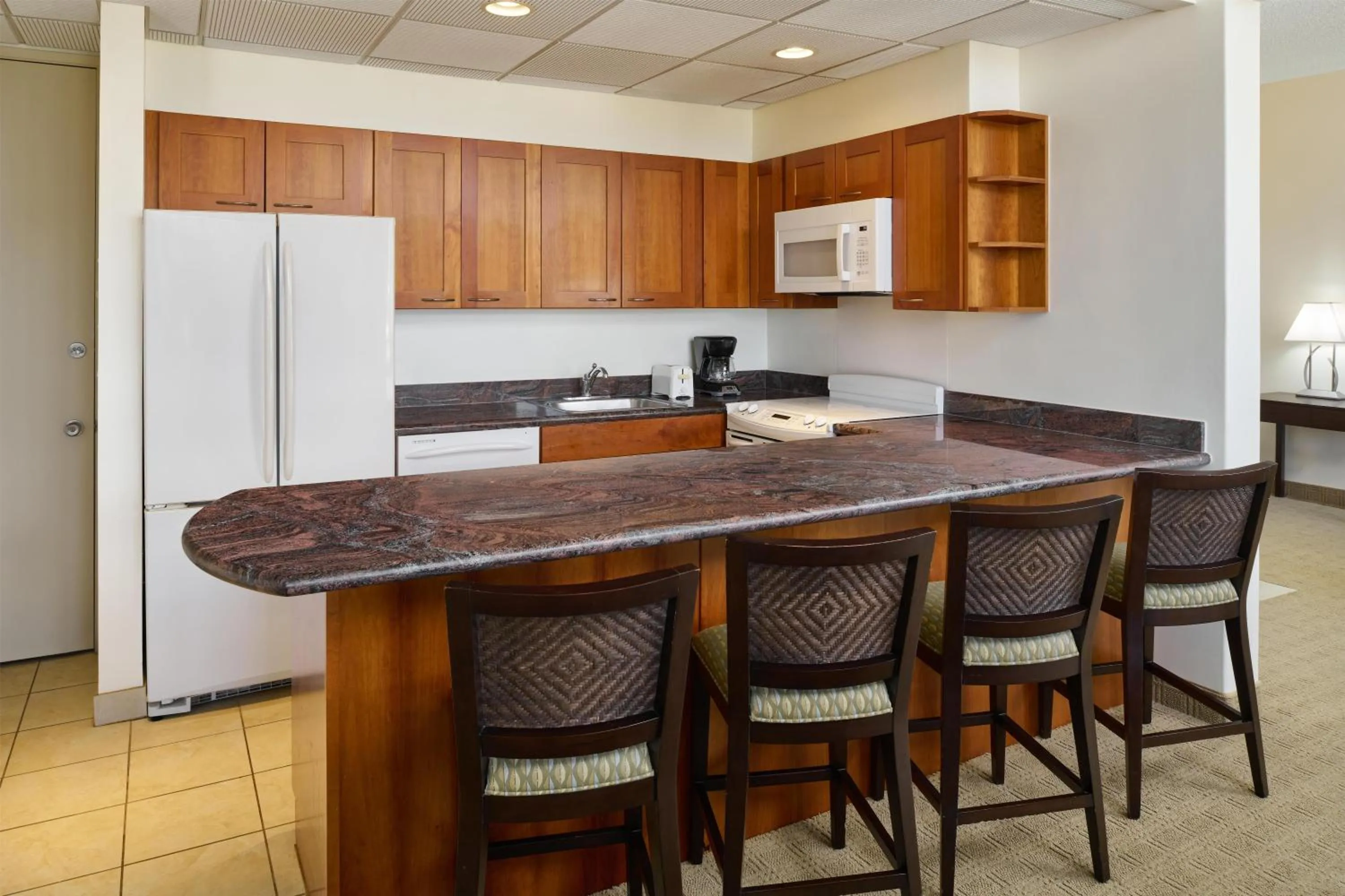 Kitchen or kitchenette in Aston Waikiki Sunset