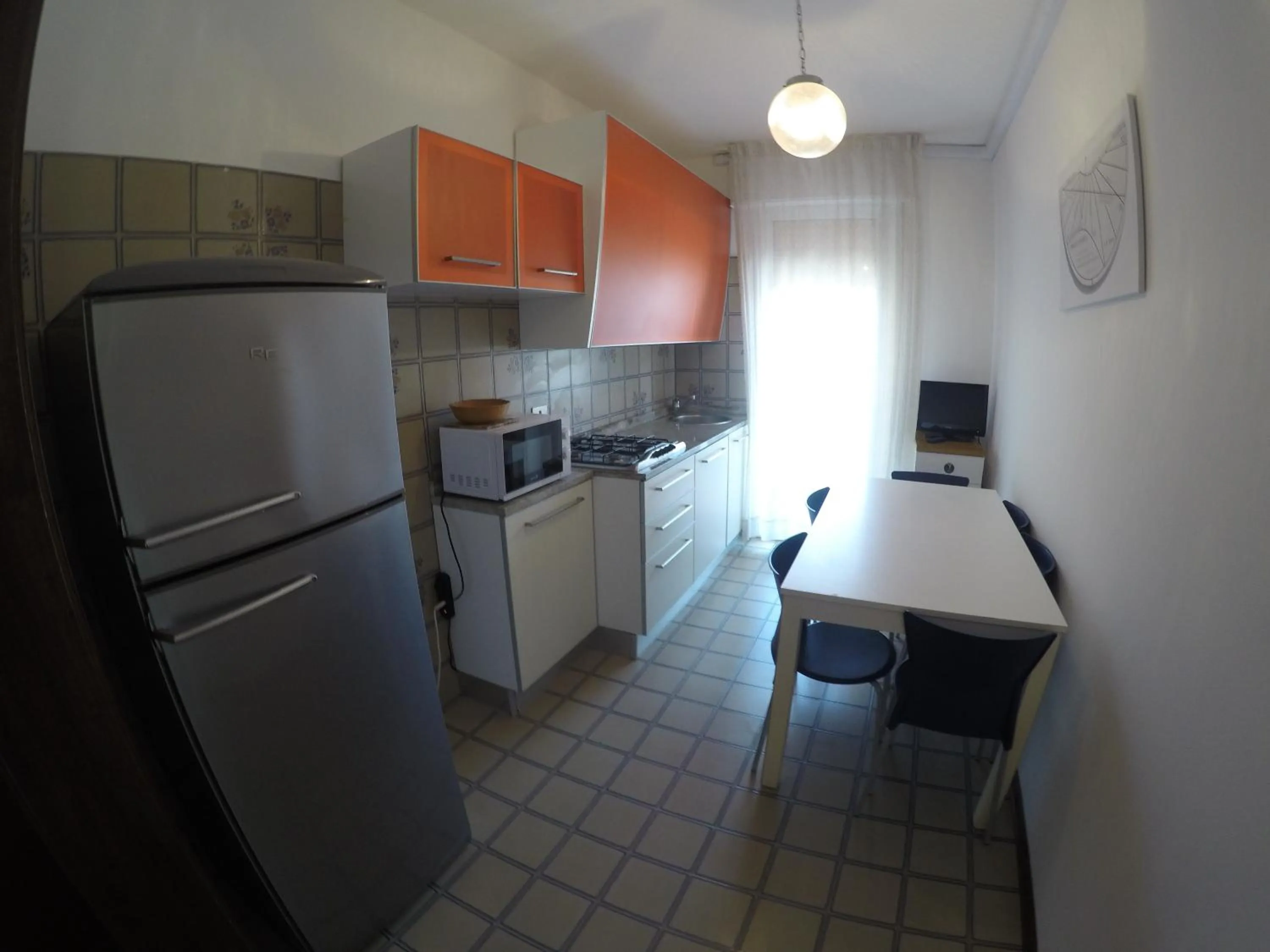 Kitchen or kitchenette in Residence Caorle Apartments - Agenzia Cocal