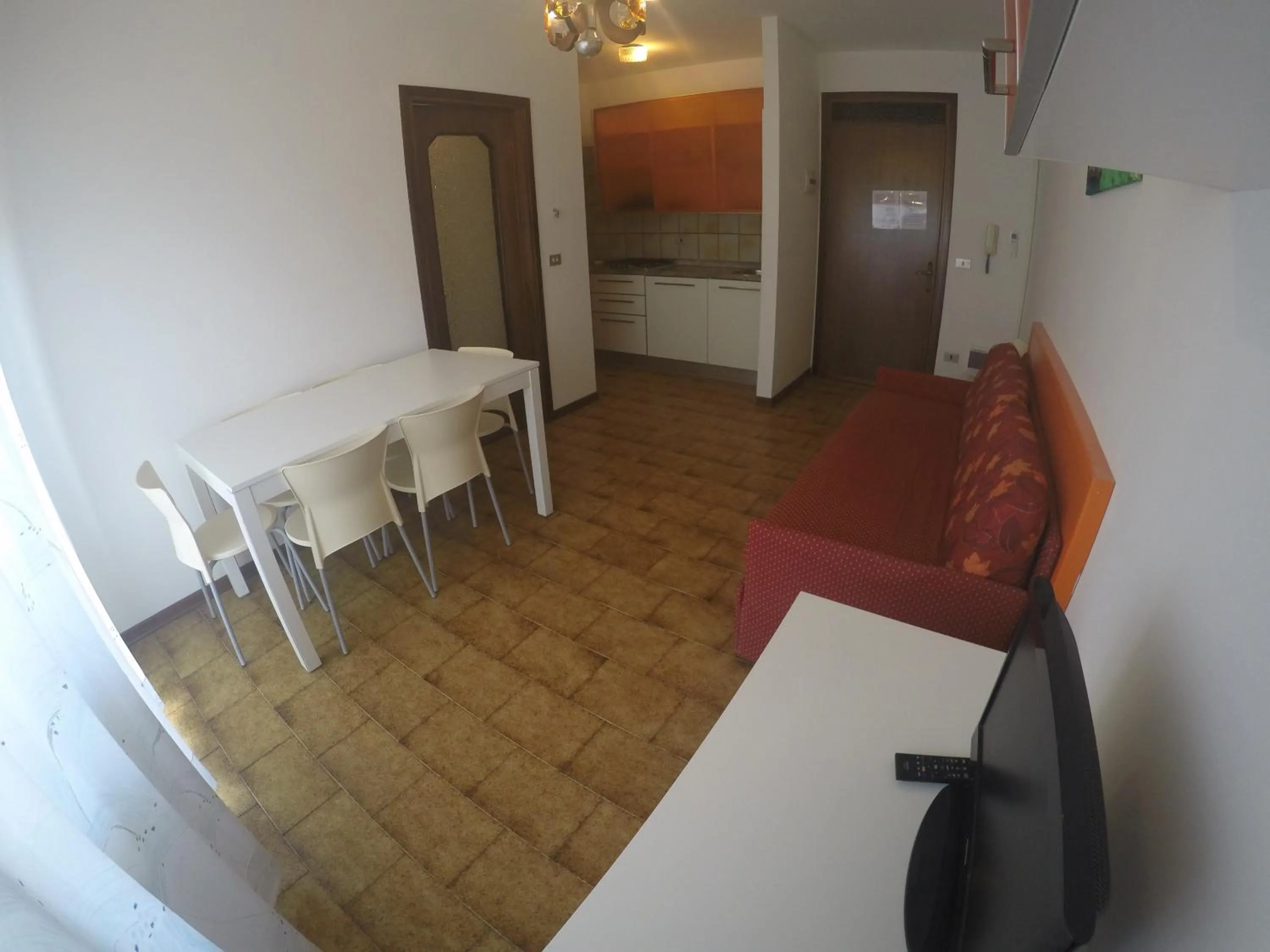 Kitchen or kitchenette in Residence Caorle Apartments - Agenzia Cocal