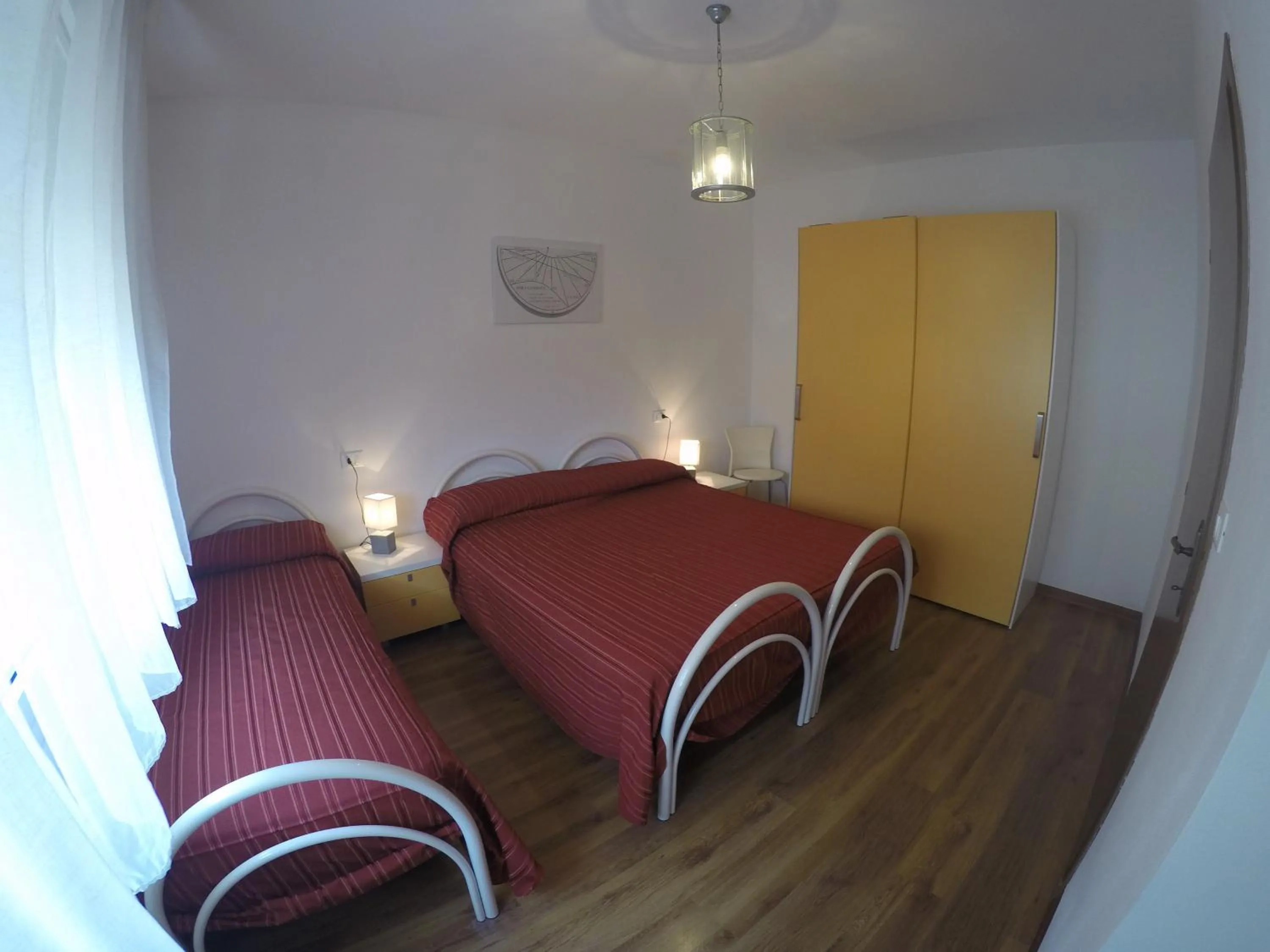 Bedroom in Residence Caorle Apartments - Agenzia Cocal