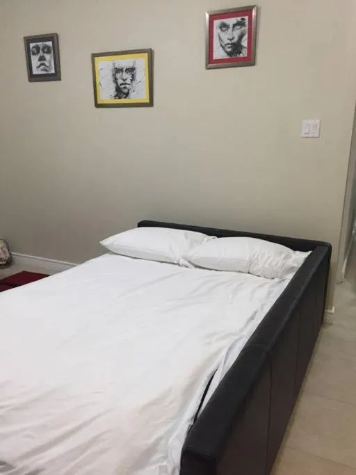 Bed in The Brompton's Luxury Apartment