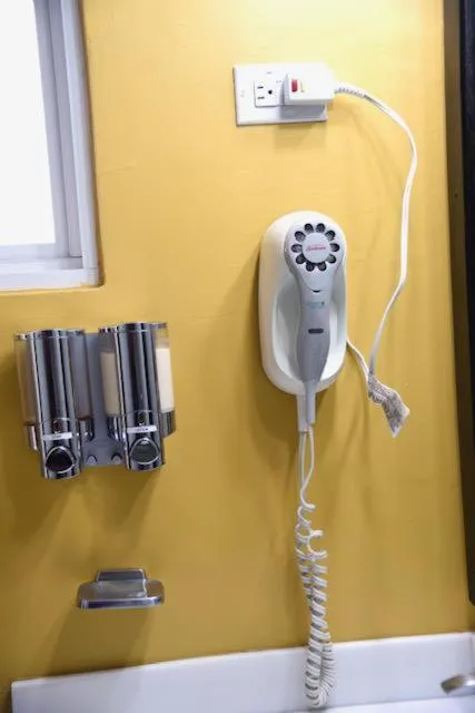 hair dryier in The Brompton's Luxury Apartment