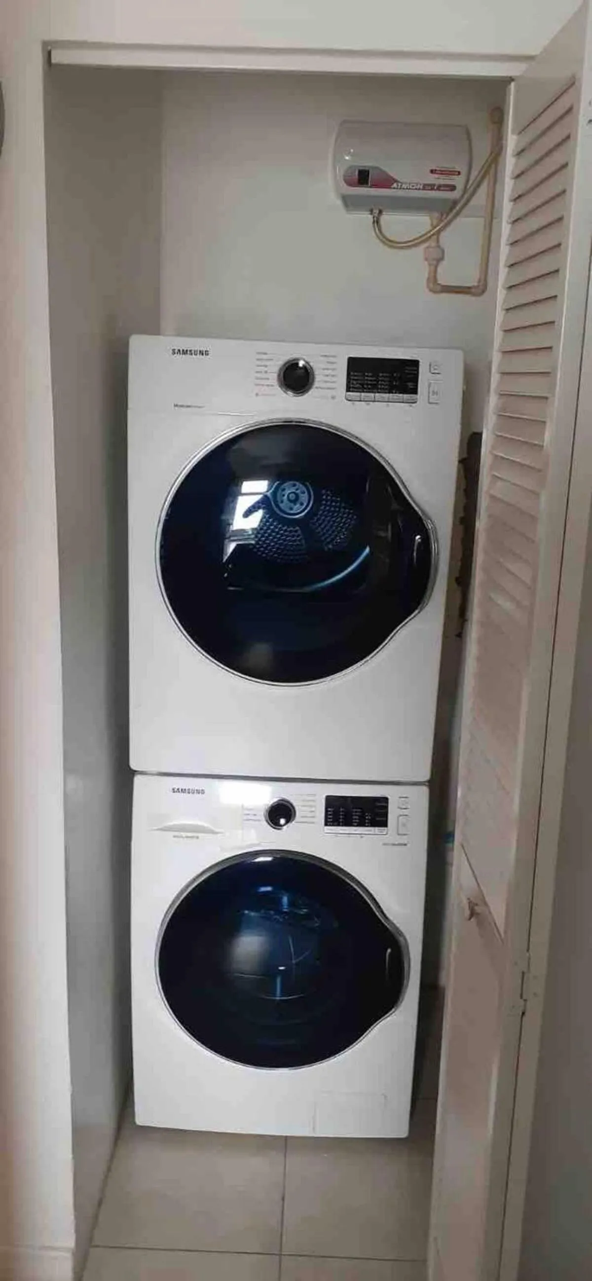 washing machine in The Brompton's Luxury Apartment