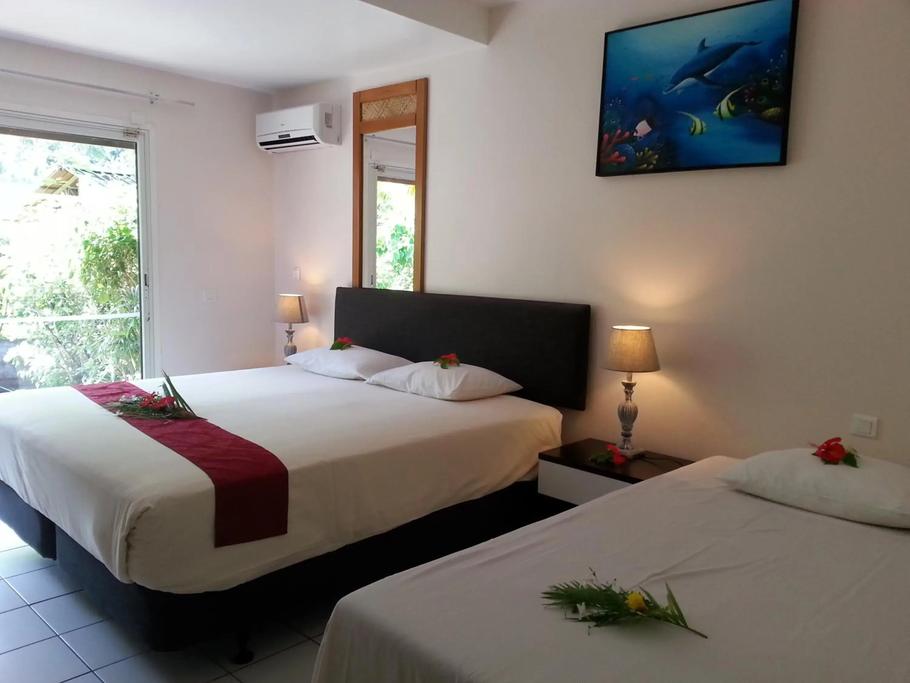 Standard Triple Room in Hotel Hibiscus Standard Triple Room in Hotel Hibiscus