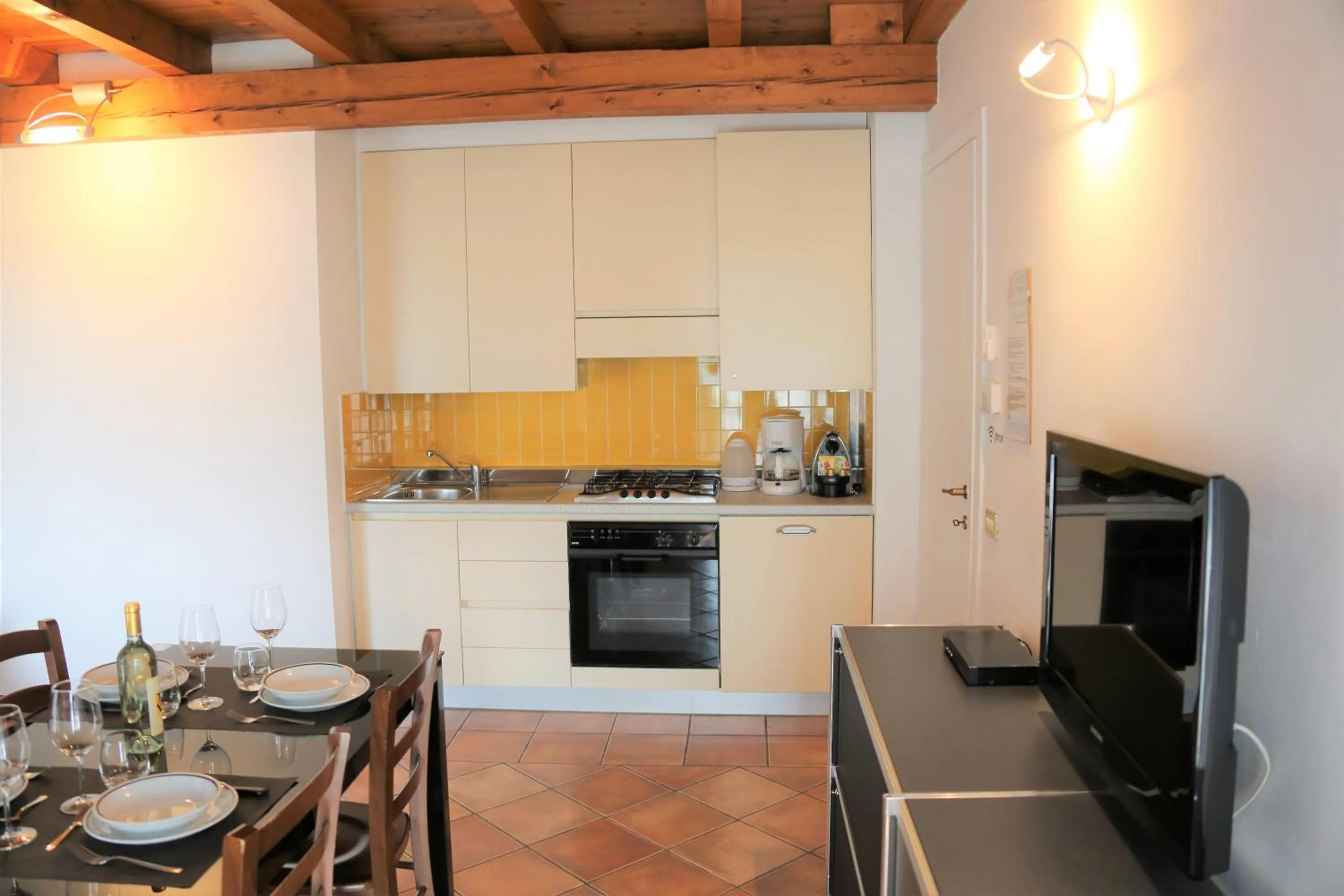 Kitchen or kitchenette in Appartamenti Ferrari Residence