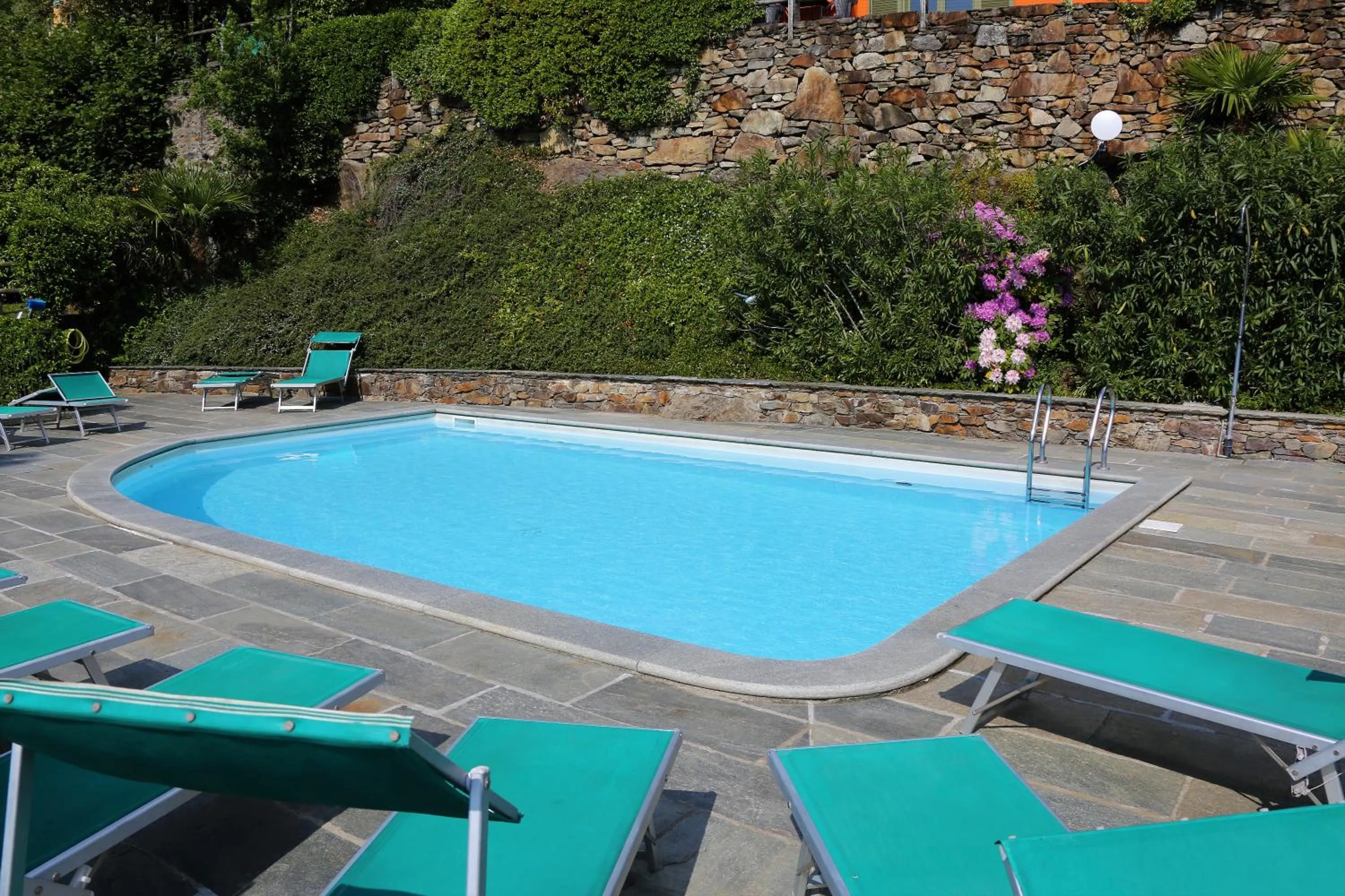 Swimming pool in Appartamenti Ferrari Residence
