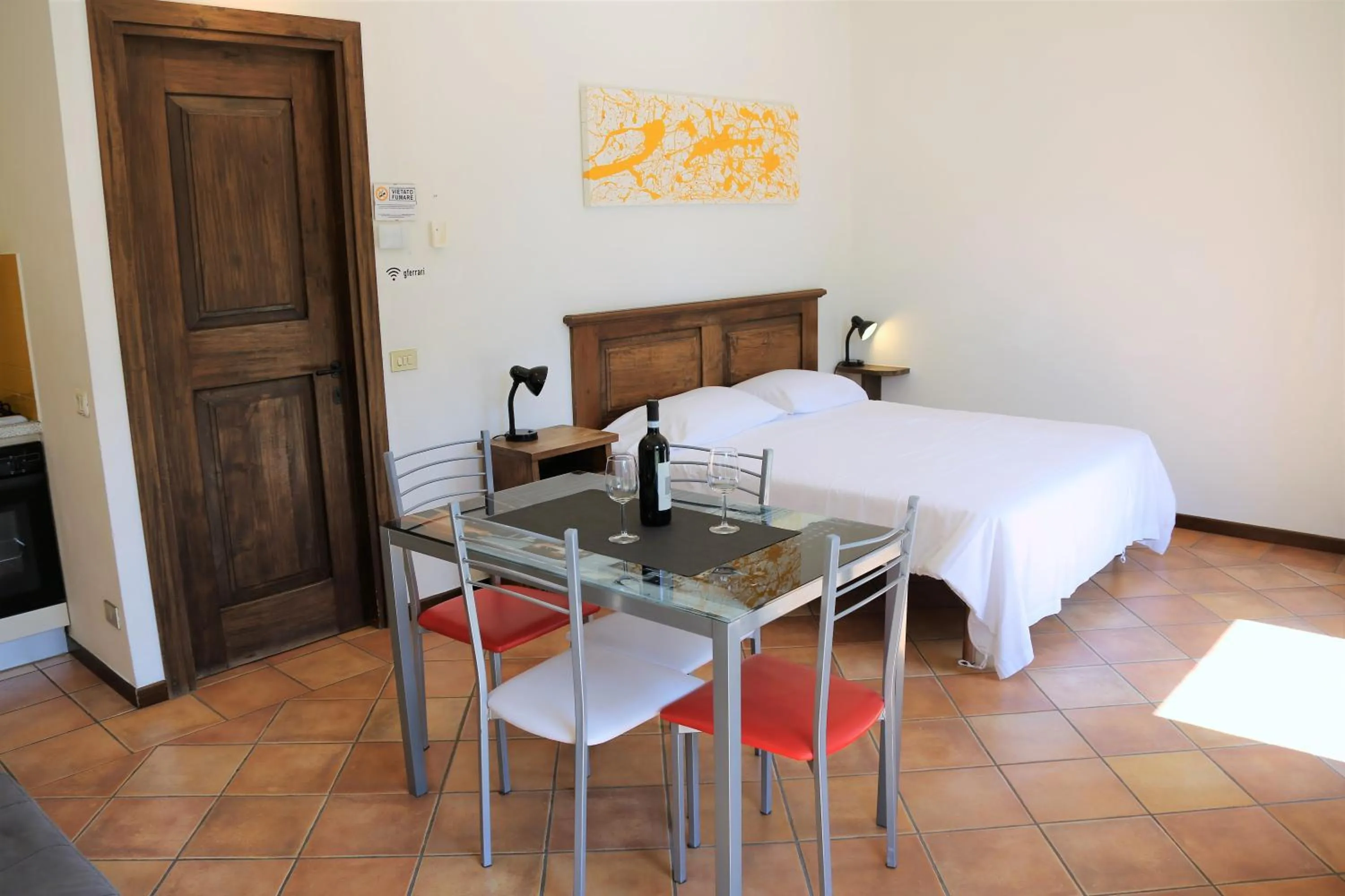 Living room, Bed in Appartamenti Ferrari Residence