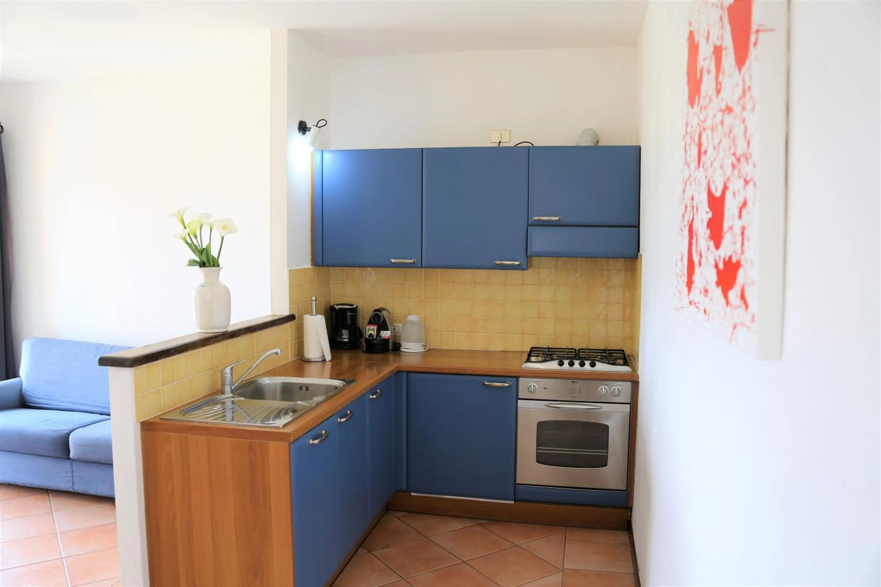 Kitchen or kitchenette in Appartamenti Ferrari Residence