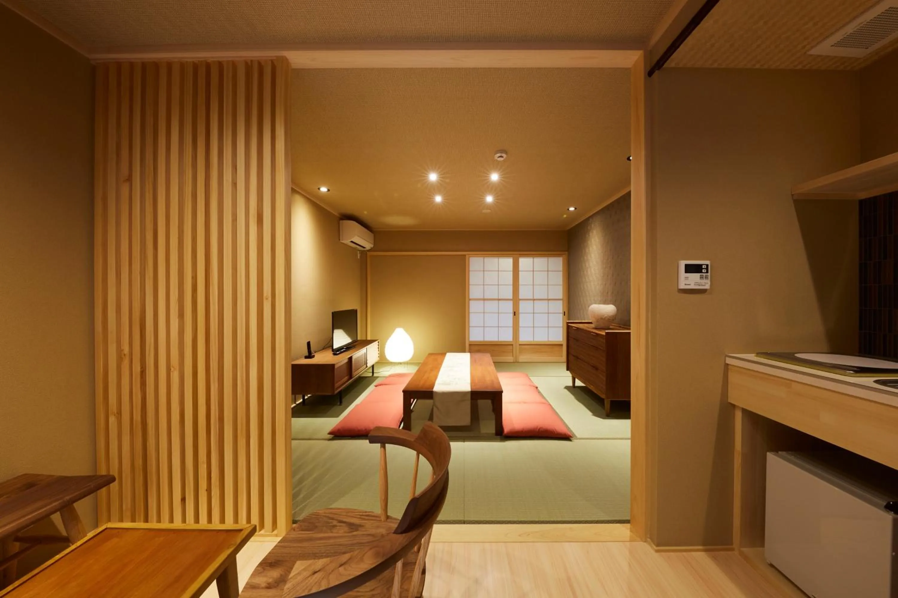 Living room, Bed in Rinn Miyagawacho Tsubaki