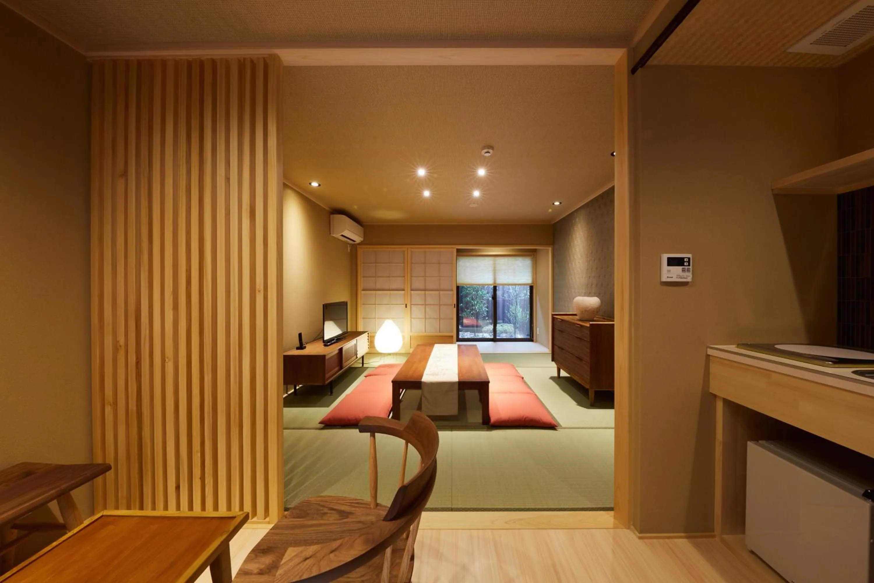 Living room, Bed in Rinn Miyagawacho Tsubaki