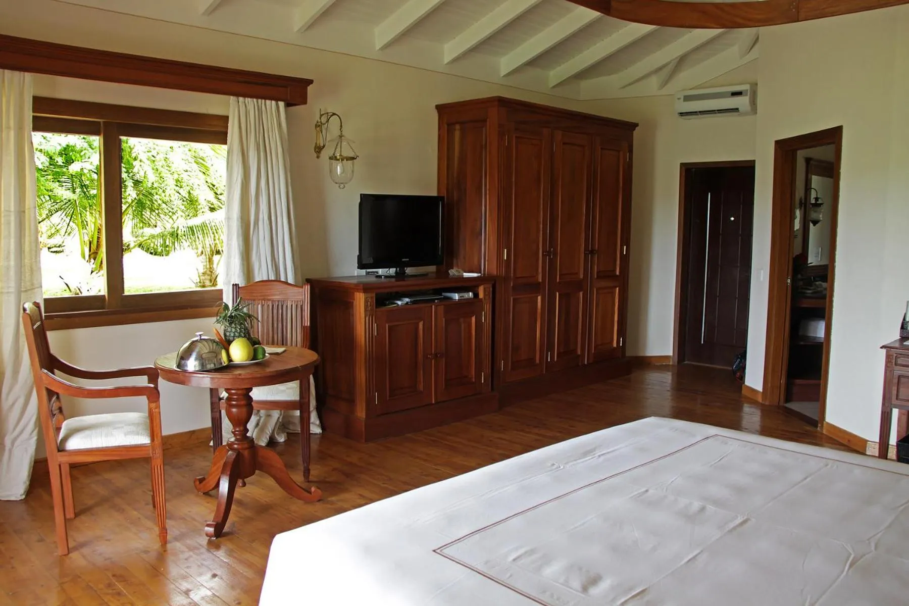 Seating area, Bed in Ocean Beach Resort & SPA