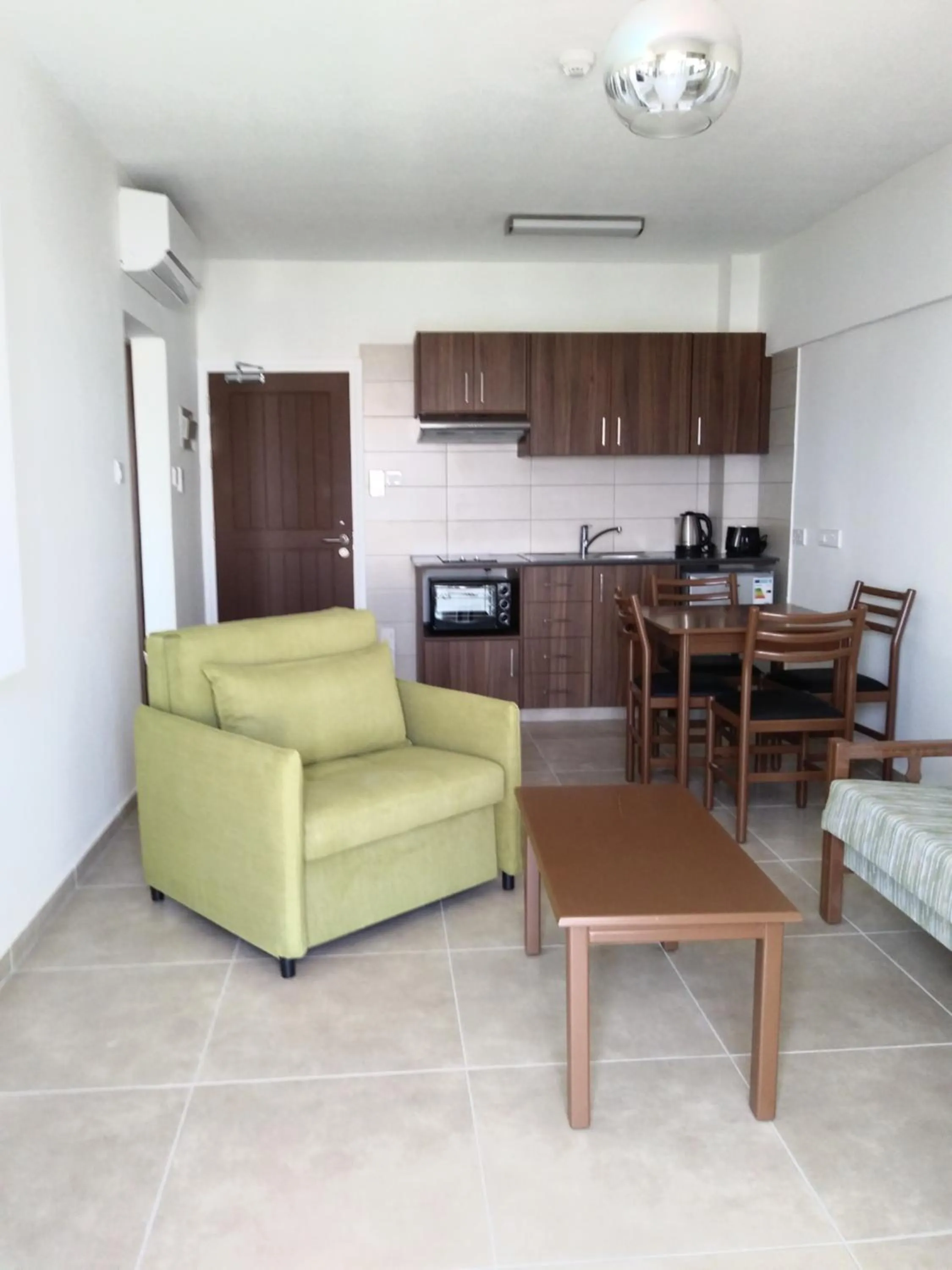 Kitchen or kitchenette in Livas Hotel Apartments