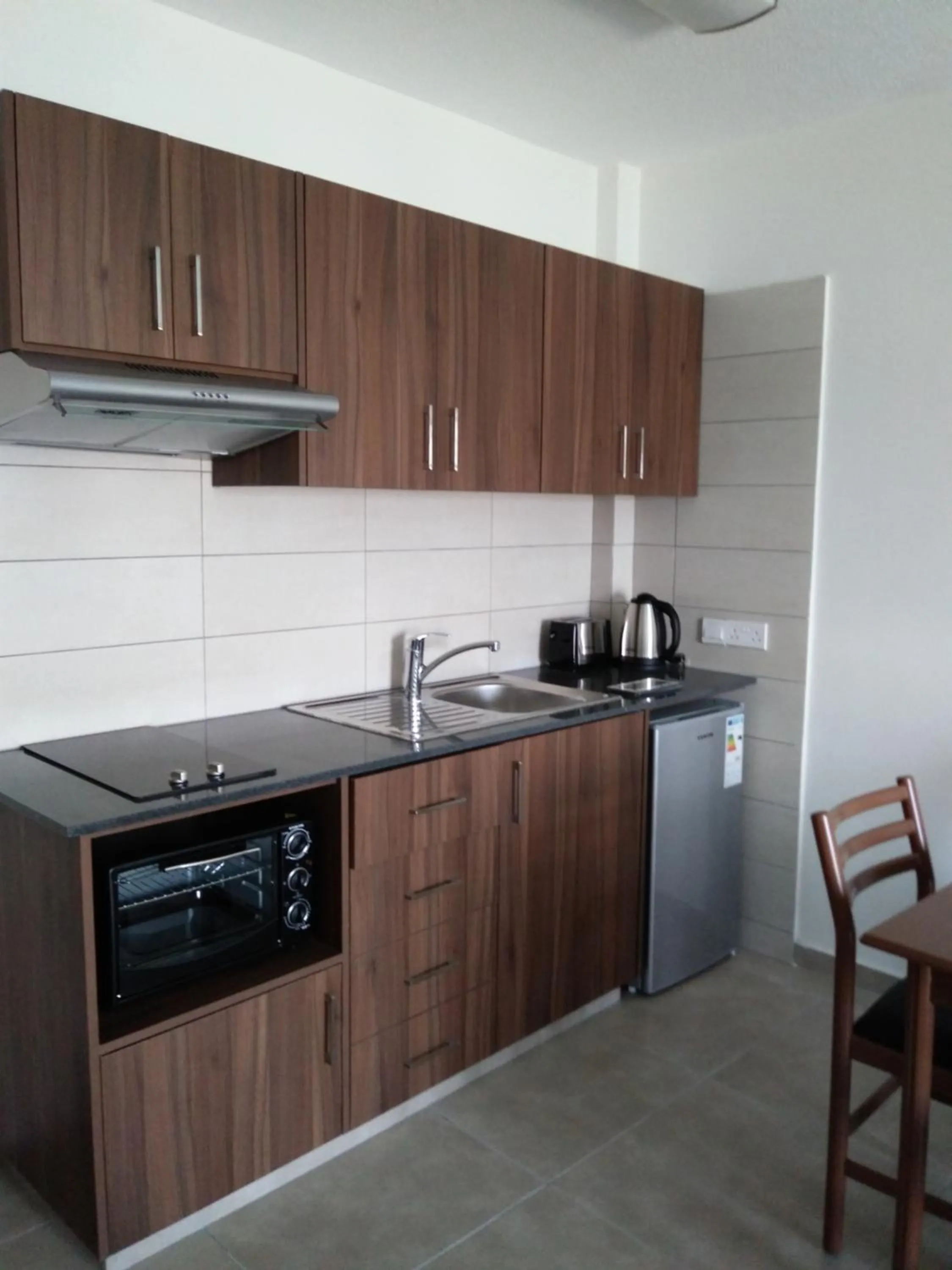 Kitchen or kitchenette in Livas Hotel Apartments