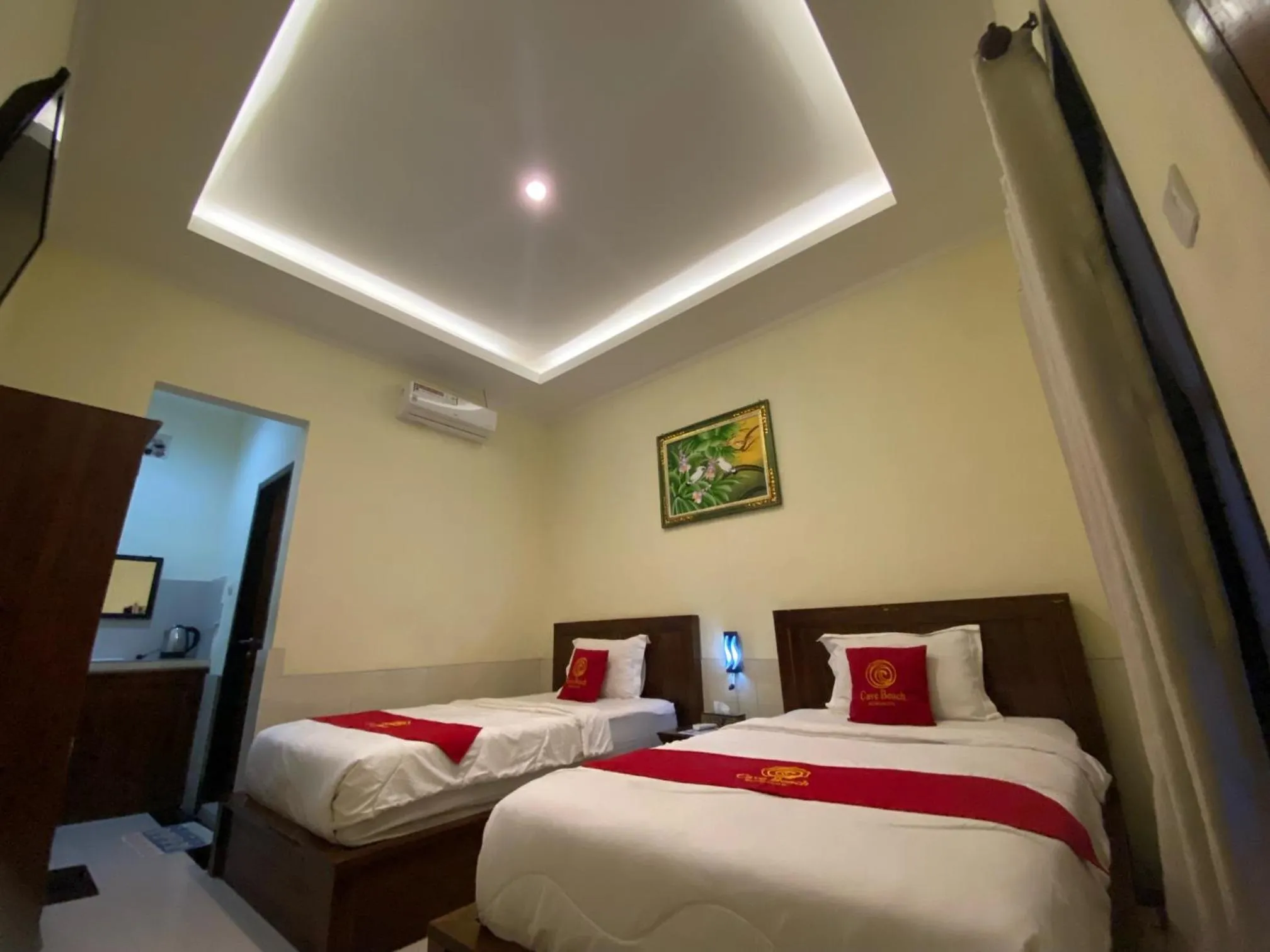 Bed in Cave Beach Bungalow