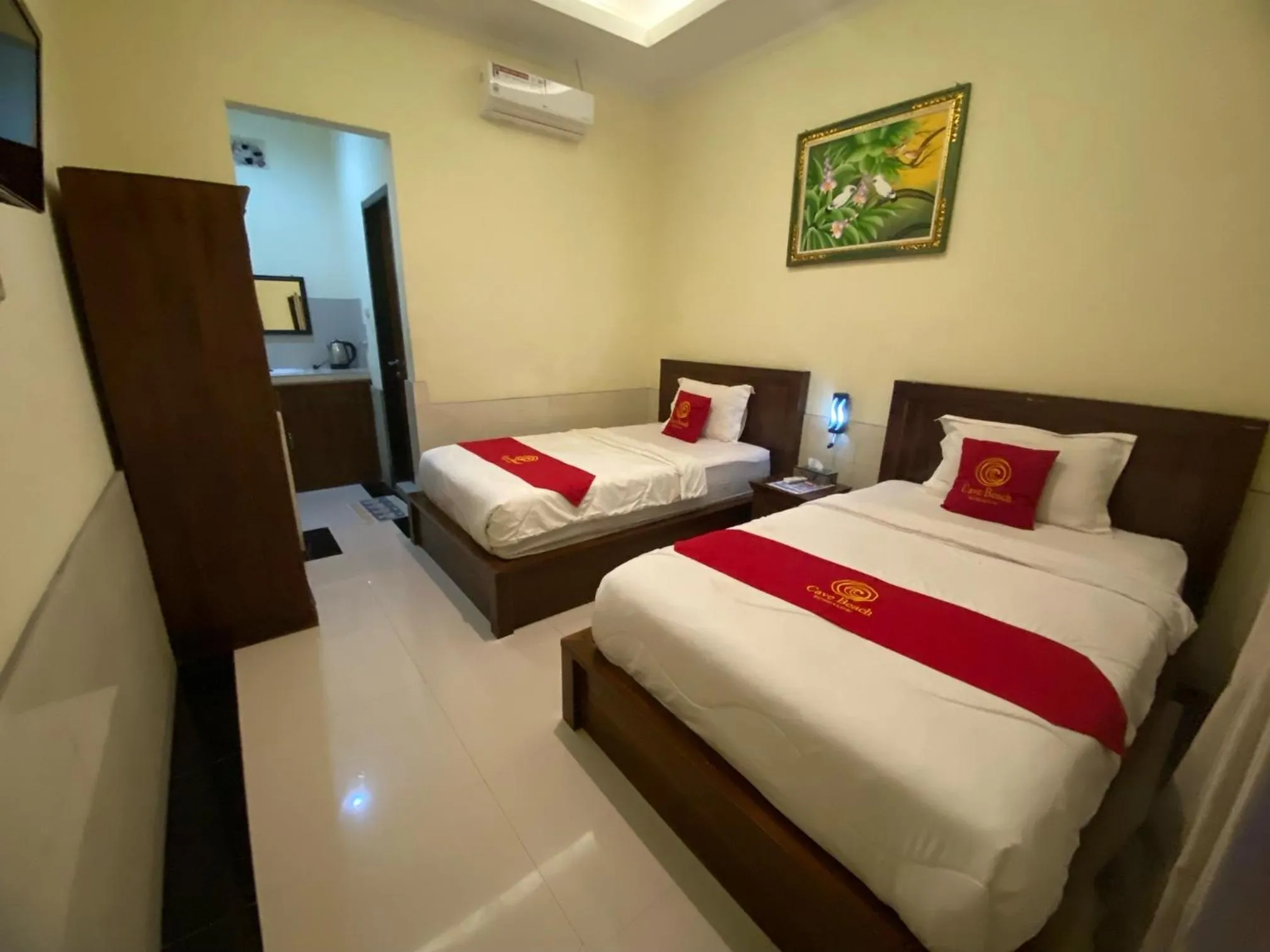 Bed in Cave Beach Bungalow