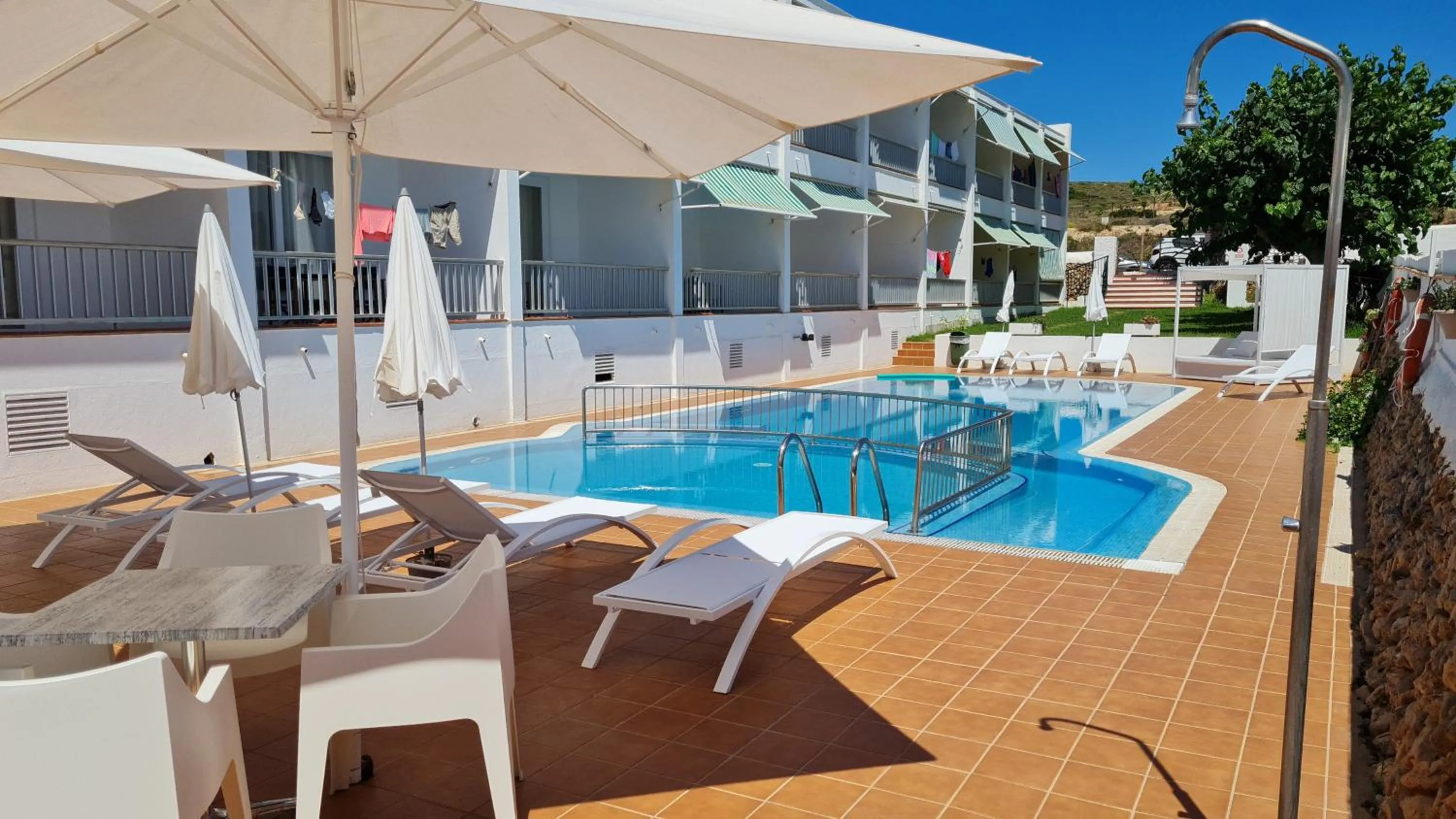 Swimming pool in Hostal S'Algaret