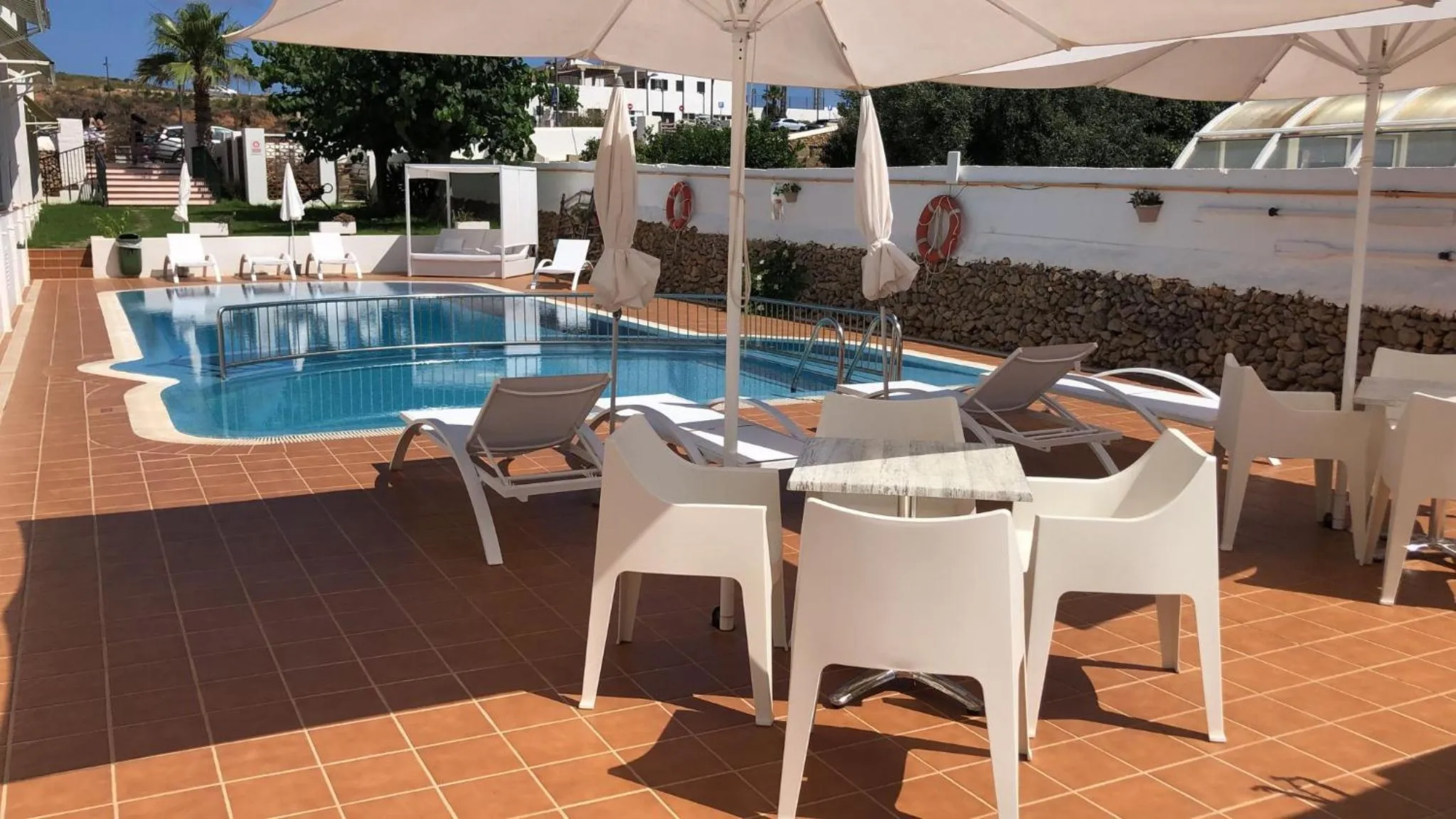 Swimming pool in Hostal S'Algaret