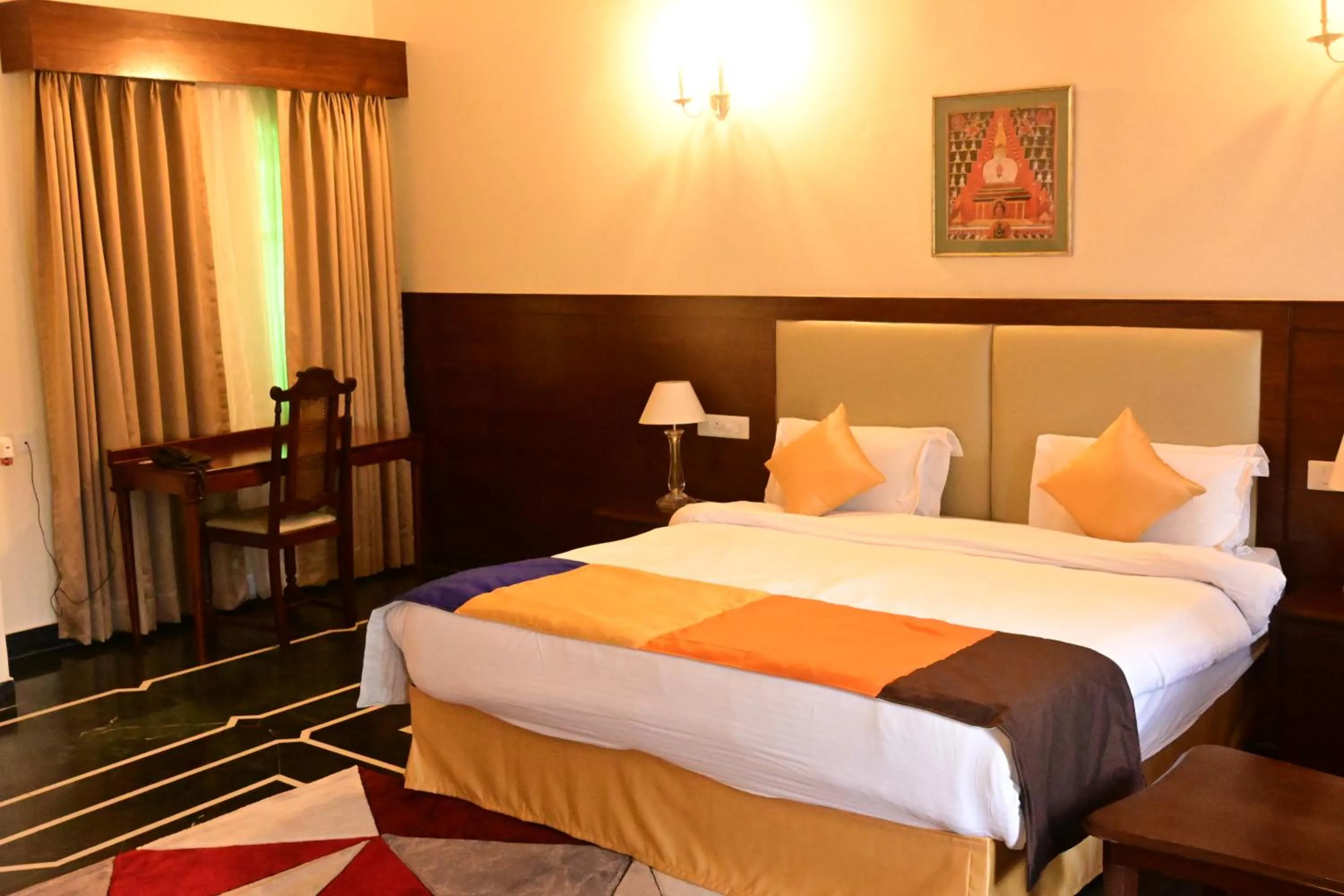 Bed in WelcomHeritage Taragarh Palace