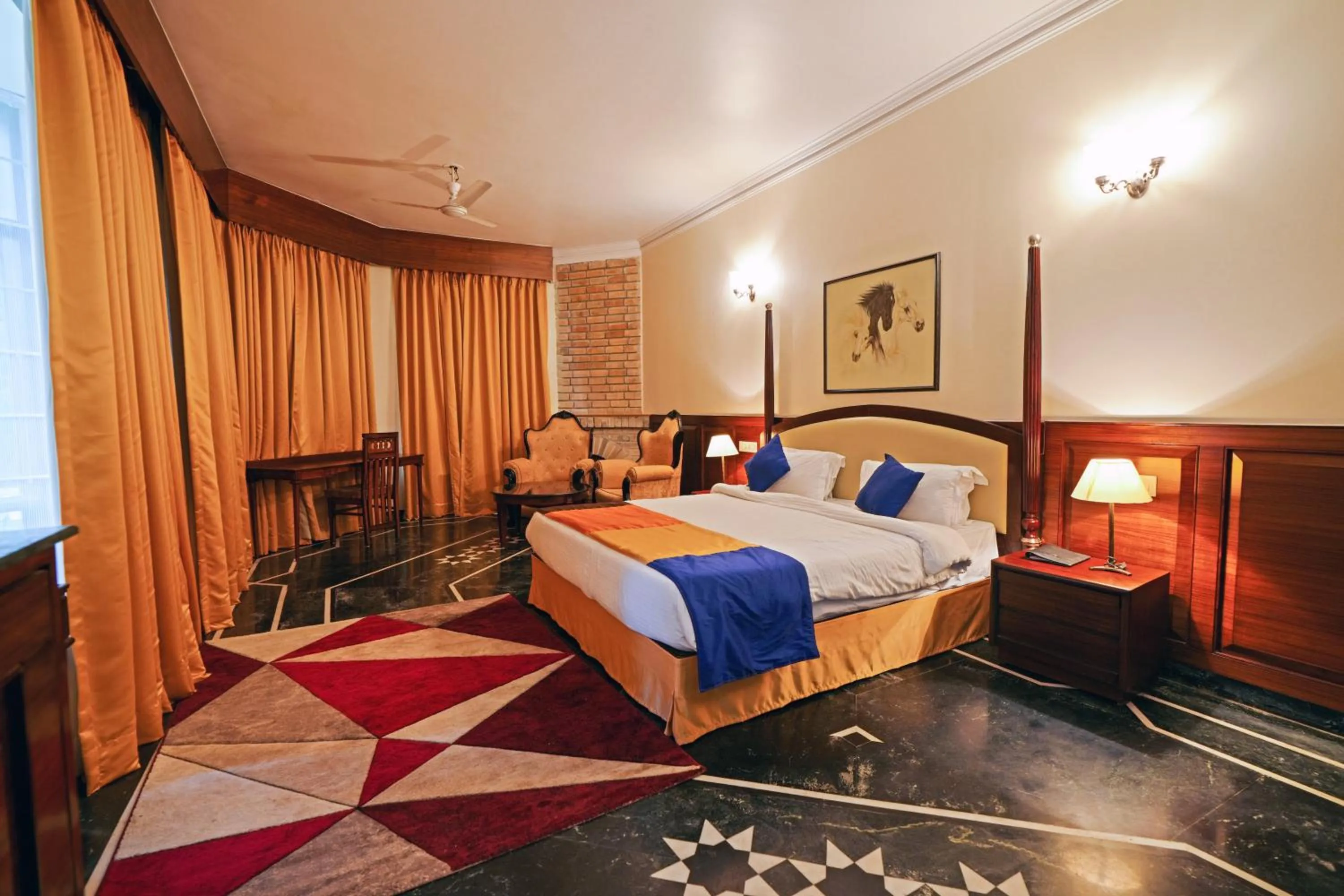 Bed in WelcomHeritage Taragarh Palace