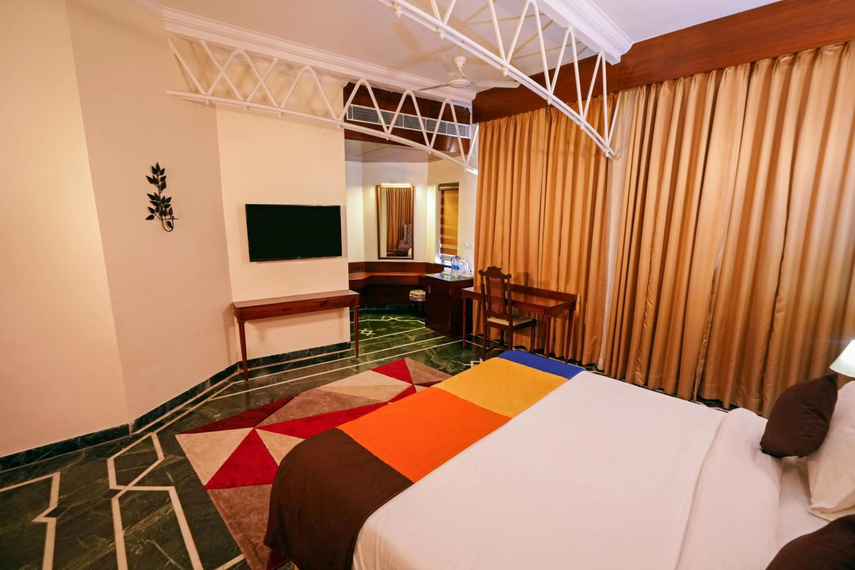 Bed in WelcomHeritage Taragarh Palace