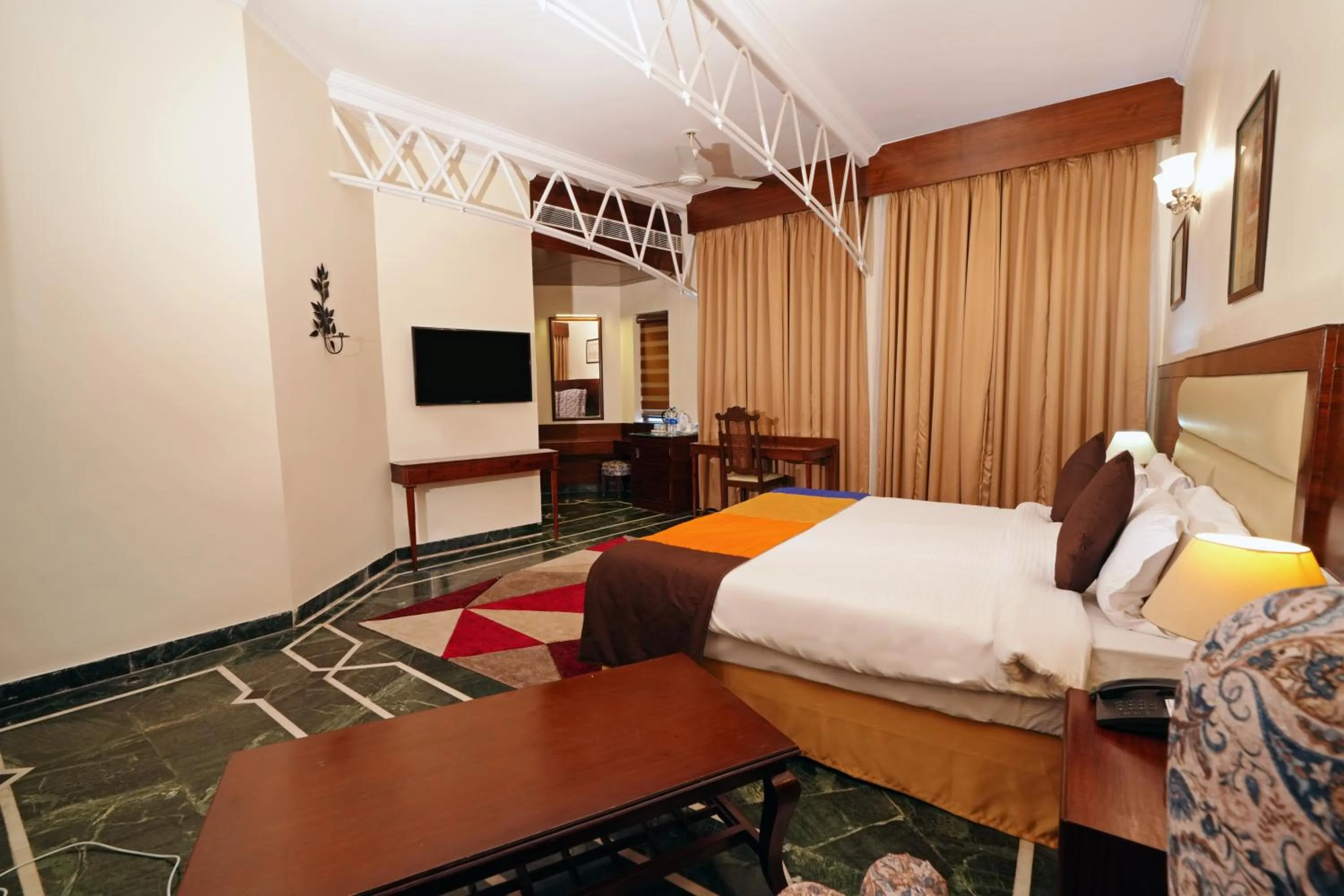 Bed in WelcomHeritage Taragarh Palace