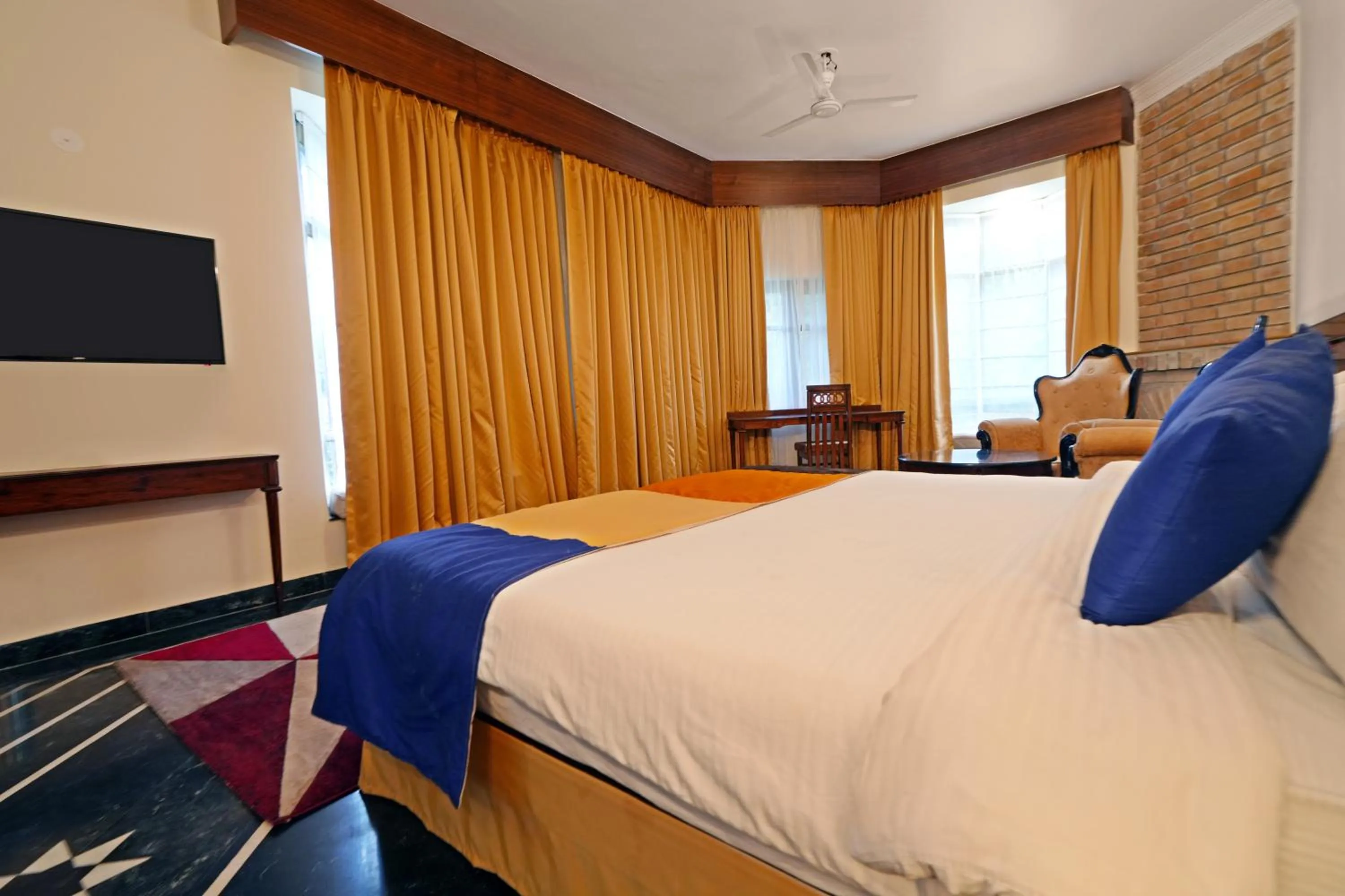 Bed in WelcomHeritage Taragarh Palace