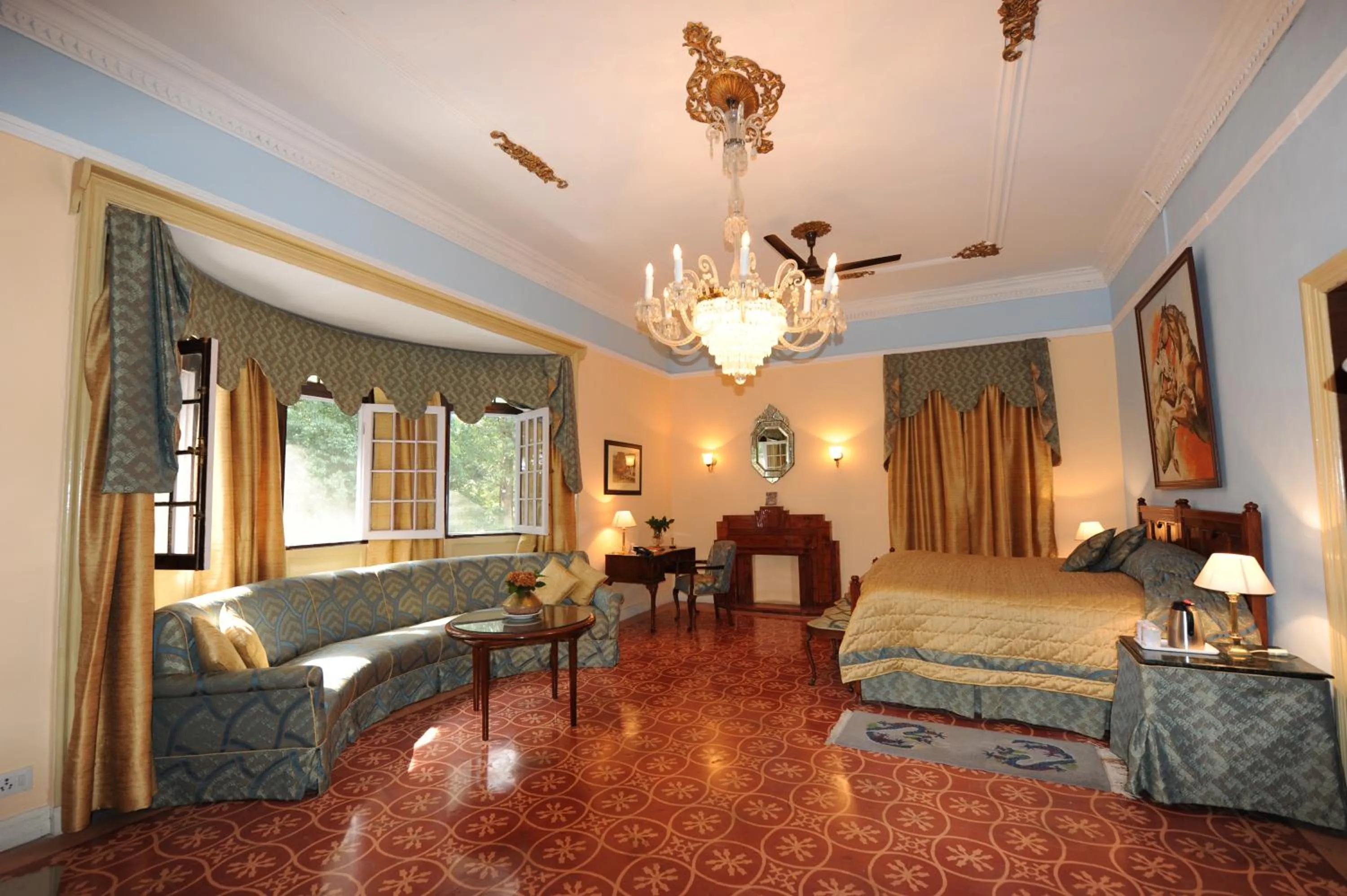 Bed in WelcomHeritage Taragarh Palace