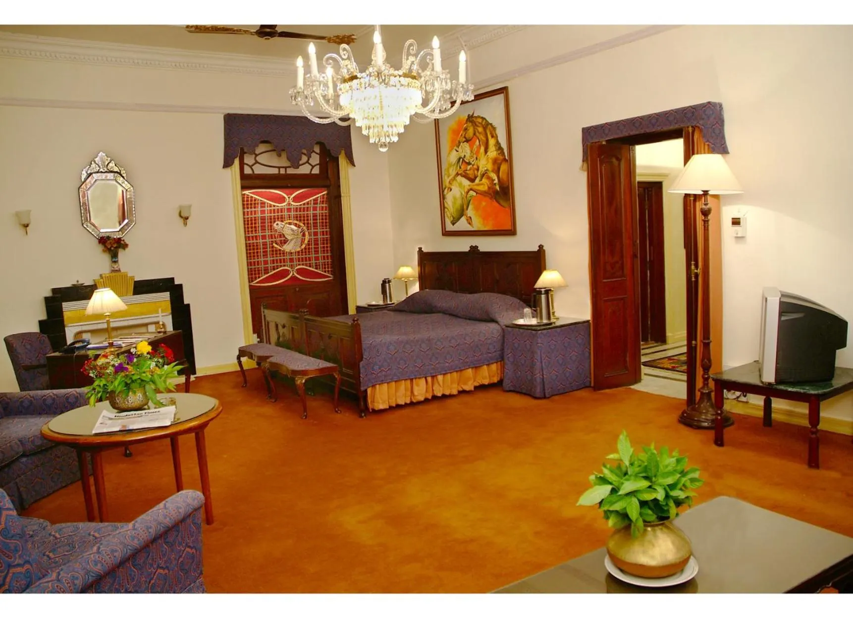 Bed in WelcomHeritage Taragarh Palace