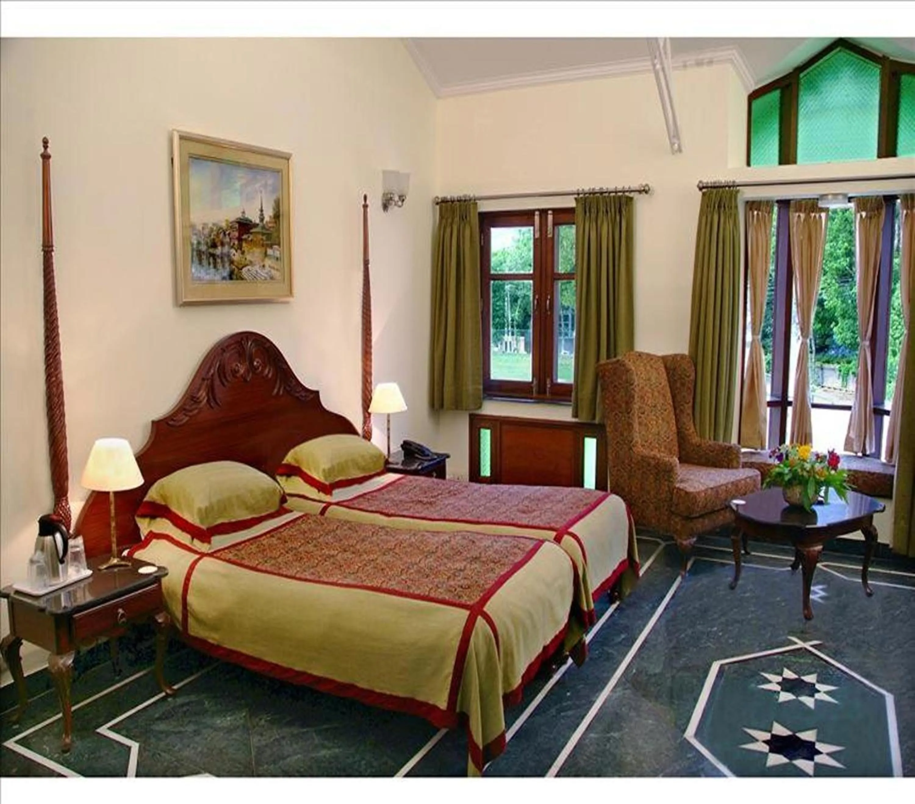 Bed in WelcomHeritage Taragarh Palace