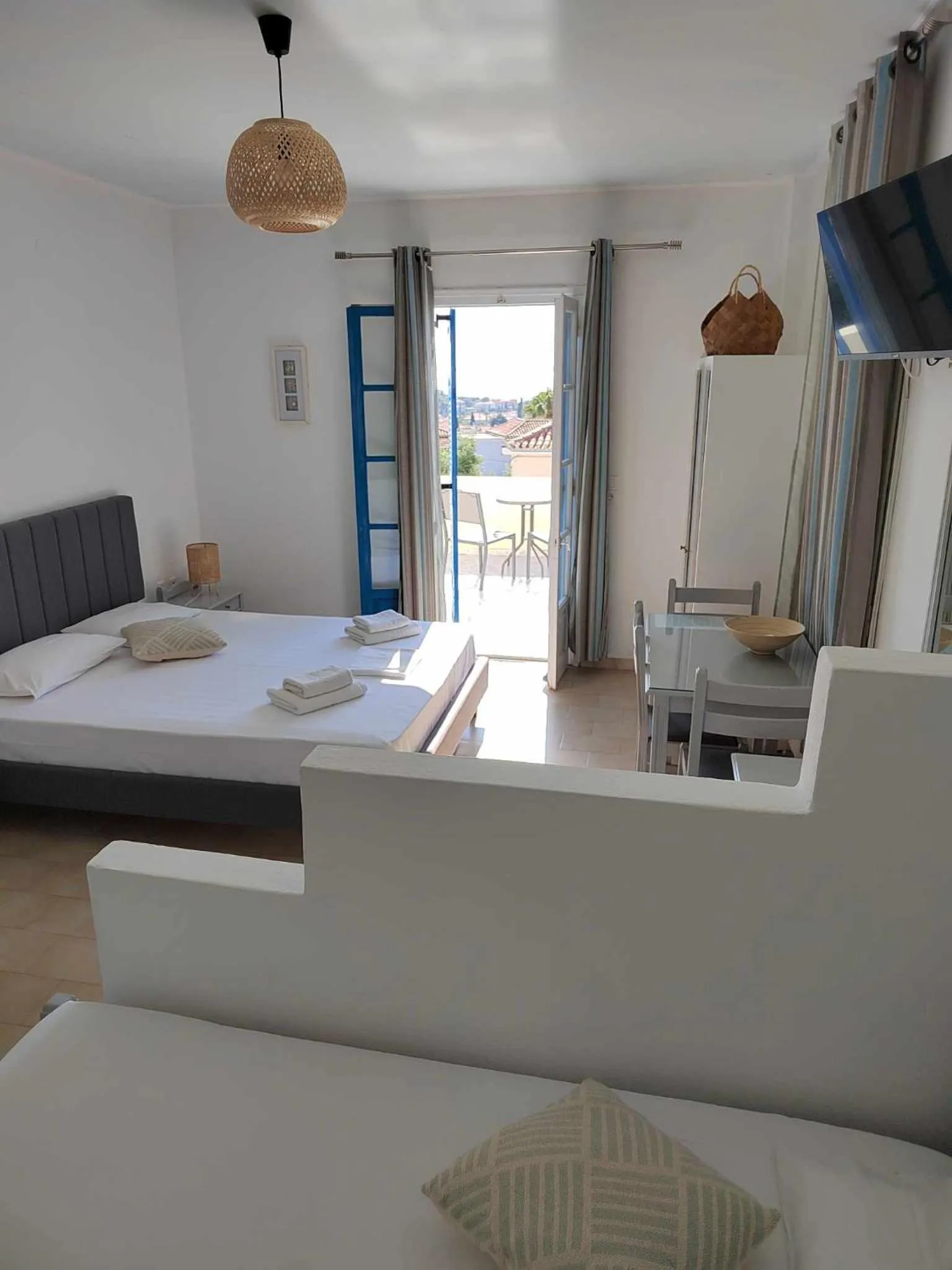 Bed in Lianos Hotel Apartments