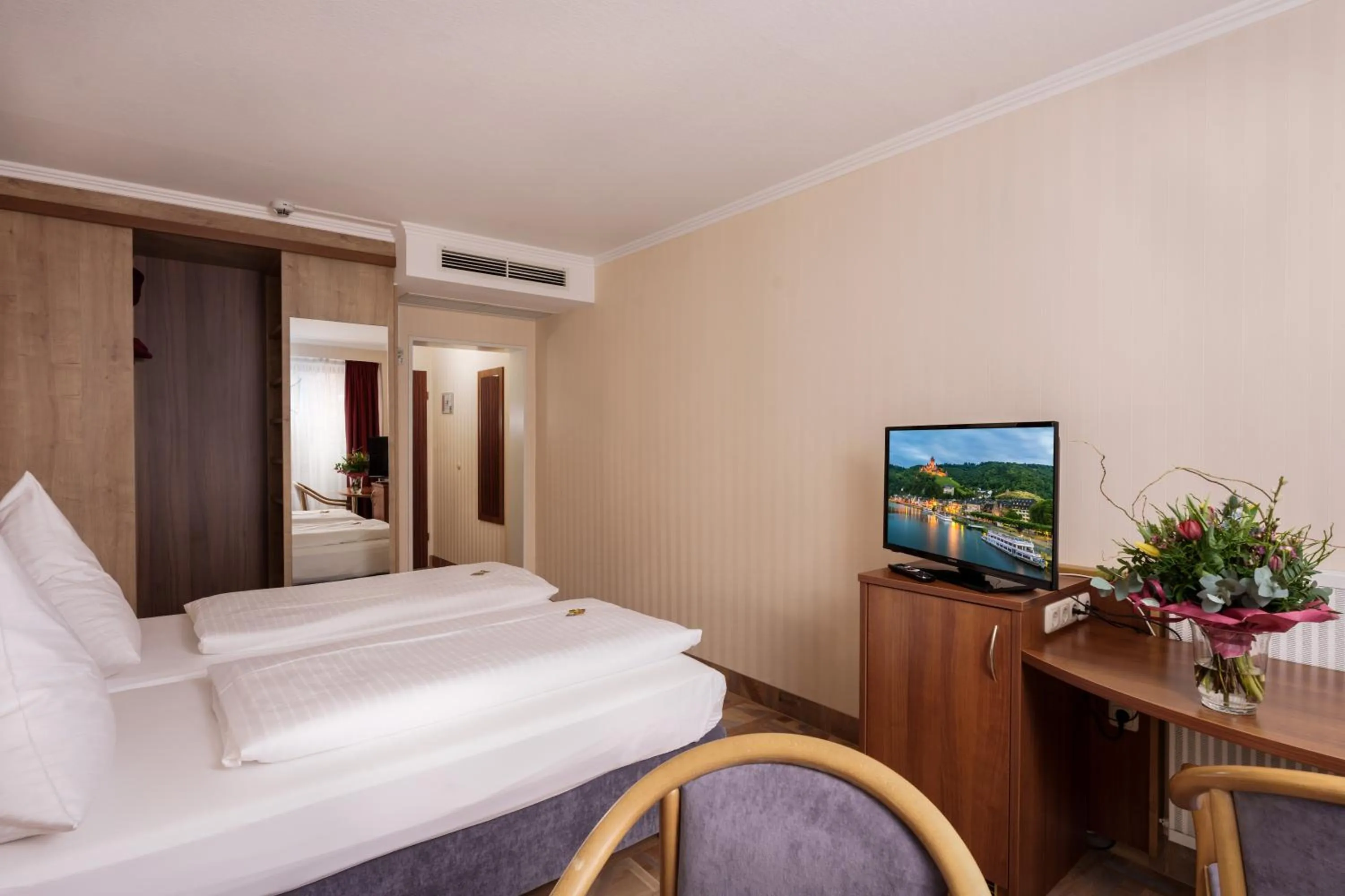 Photo of the whole room, Bed in Moselstern Hotel Brixiade &Triton