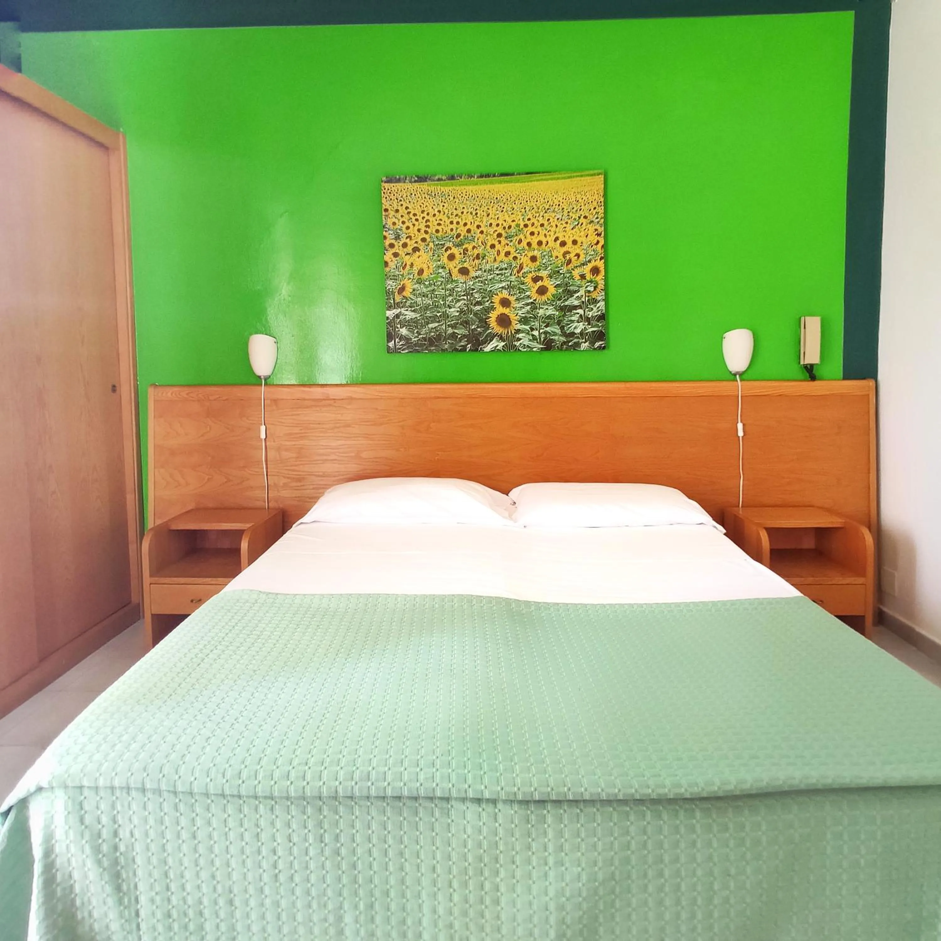 Bed in Piccolo Hotel