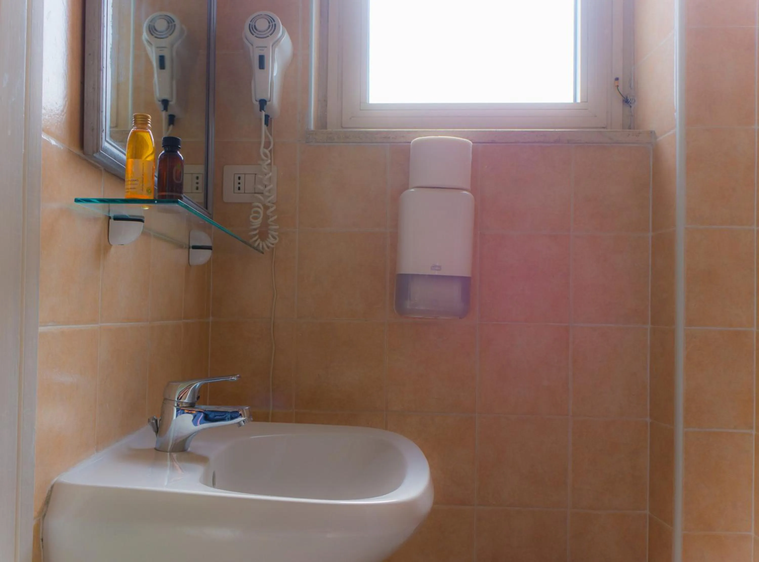 Bathroom in Piccolo Hotel