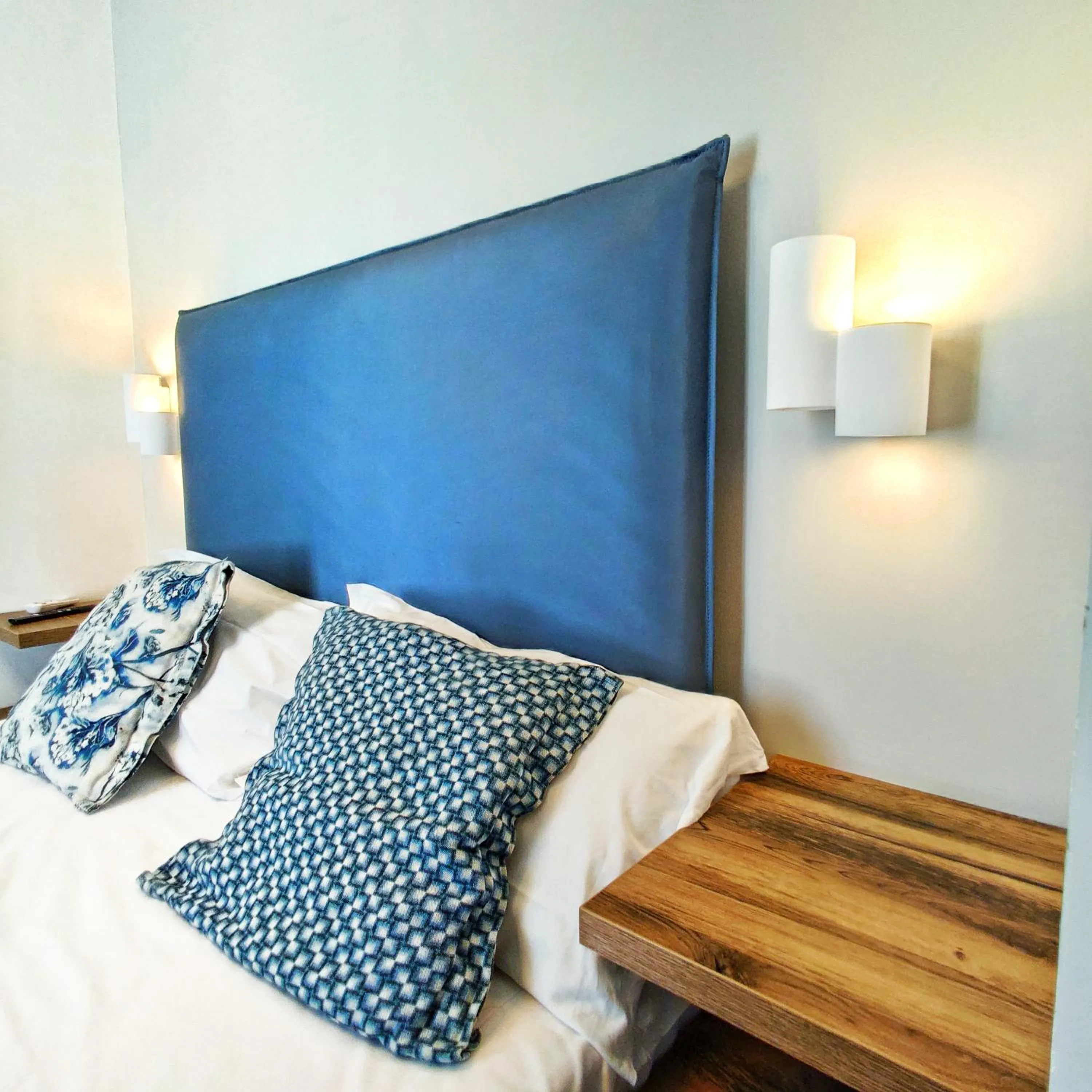 Bed in Piccolo Hotel