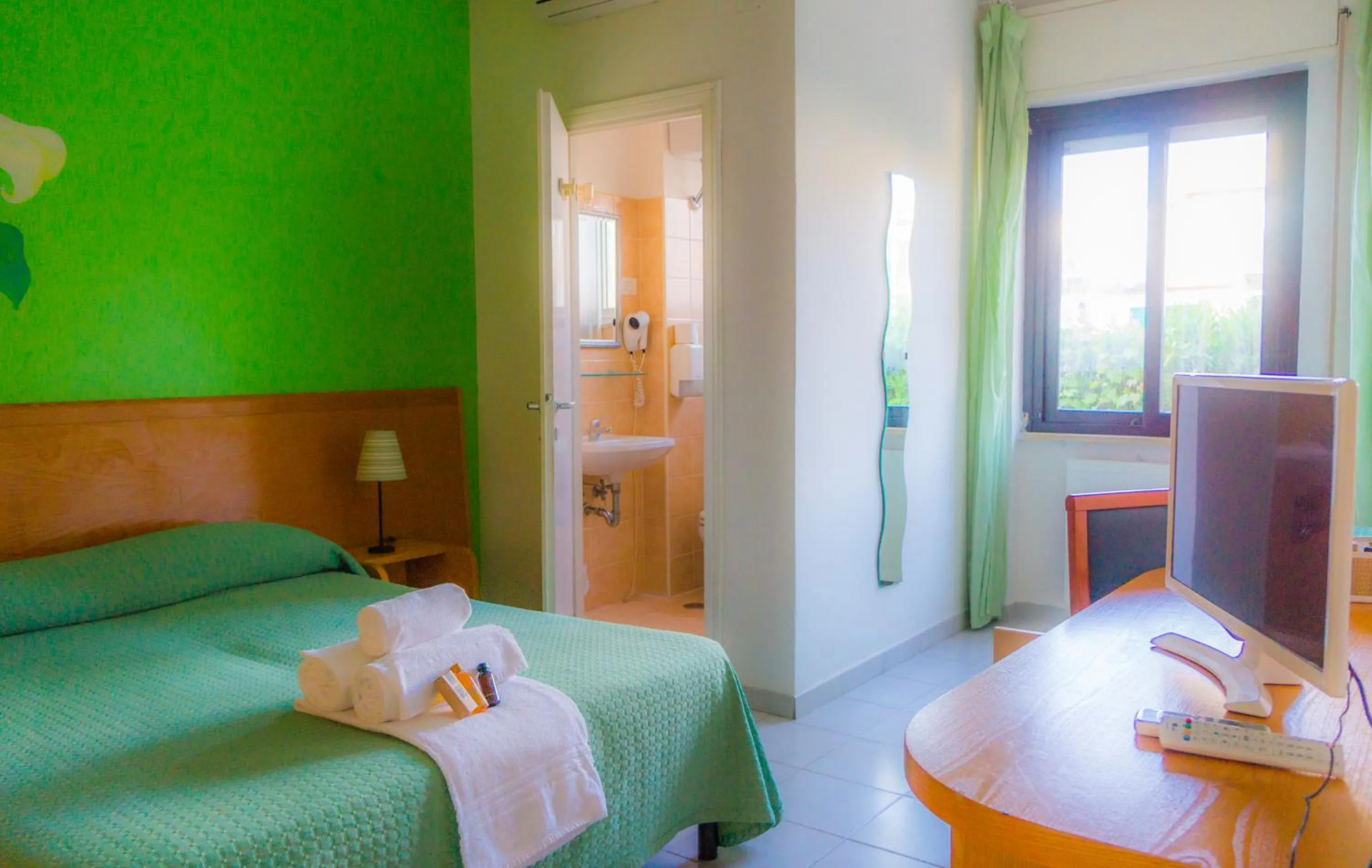 Bedroom in Piccolo Hotel