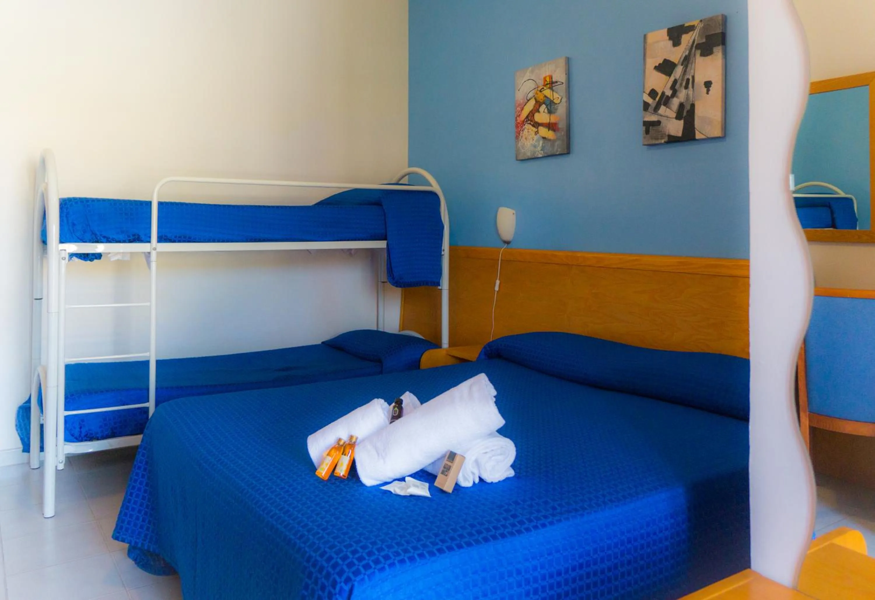 Bed in Piccolo Hotel