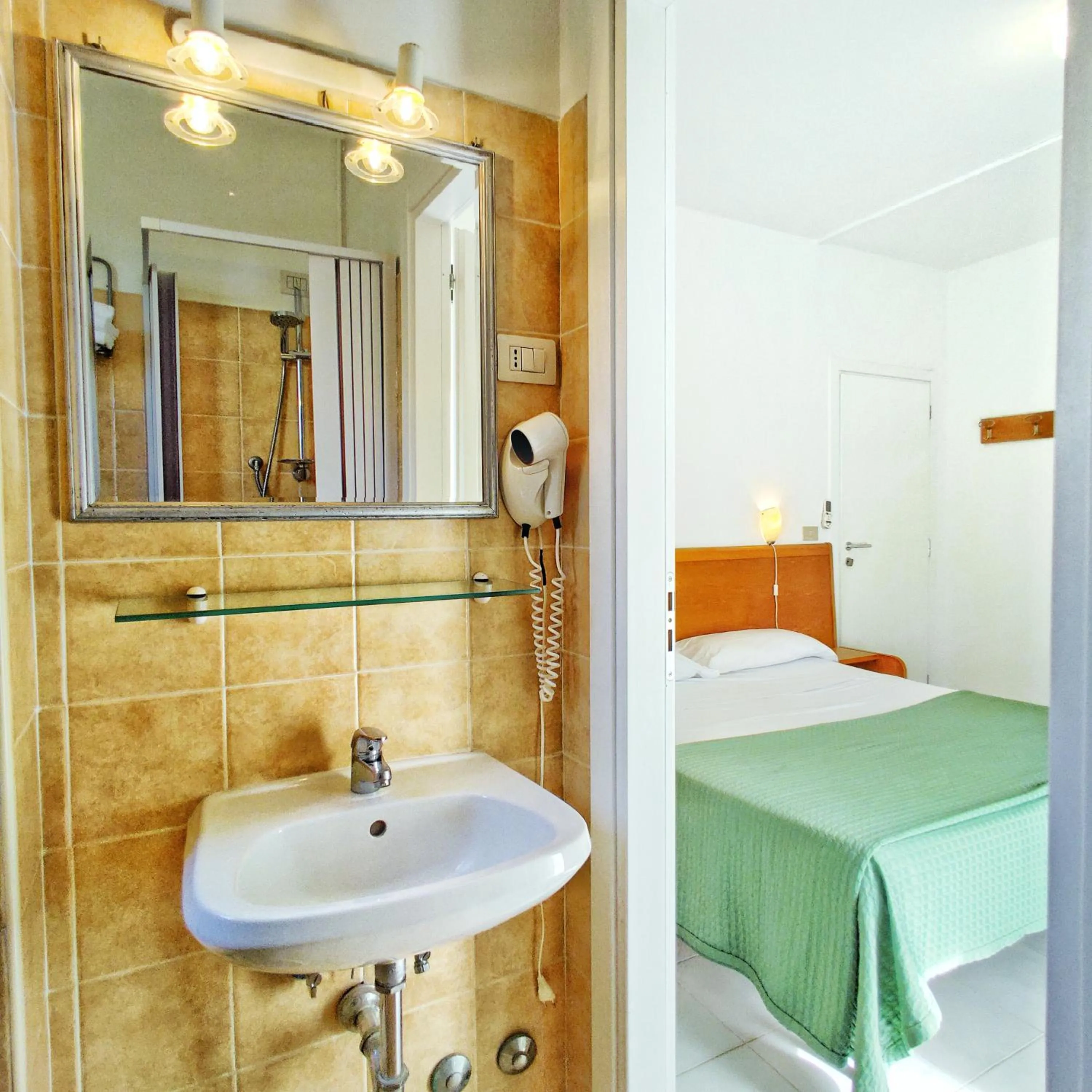 Bed in Piccolo Hotel