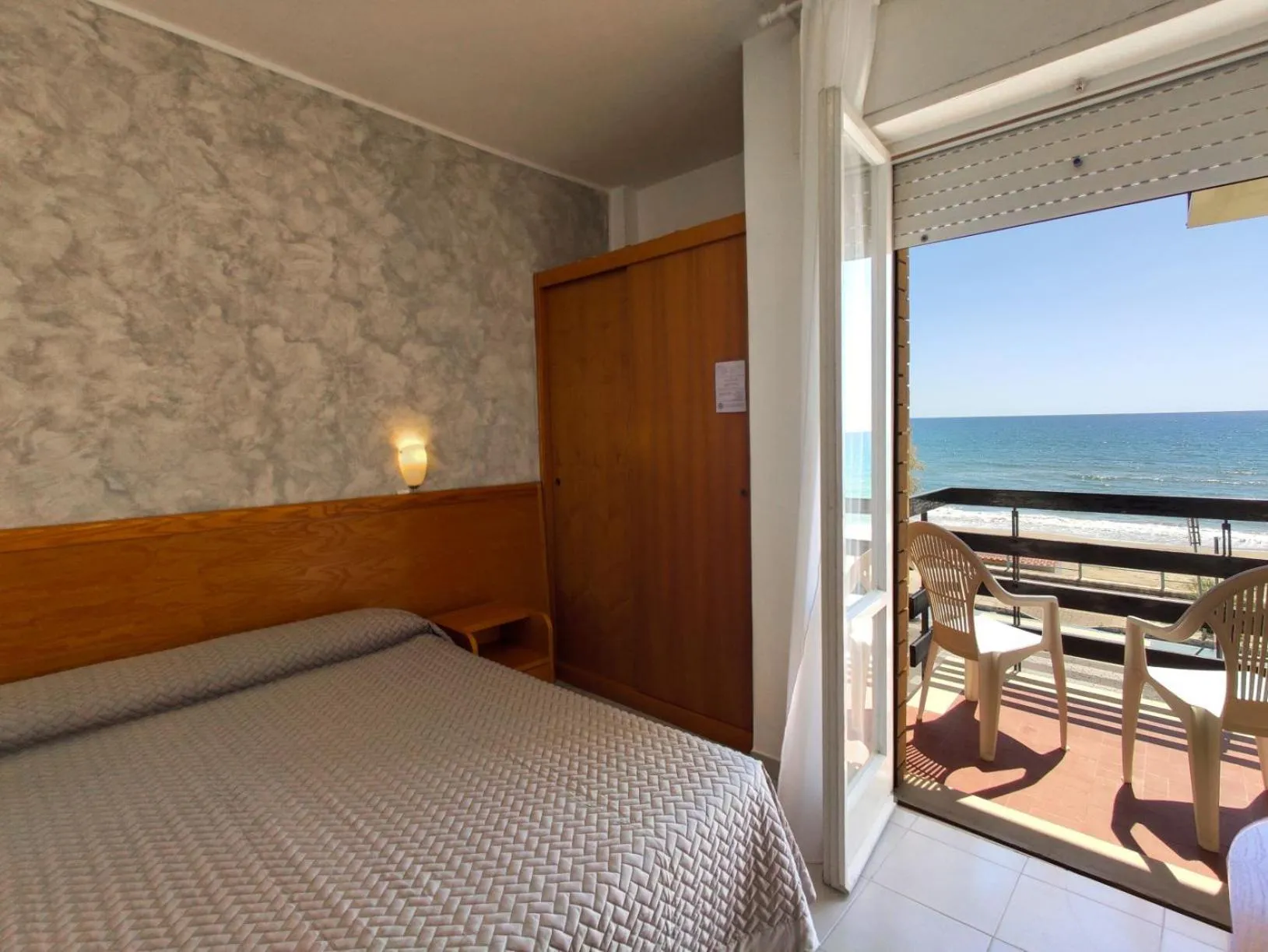 Bed in Piccolo Hotel